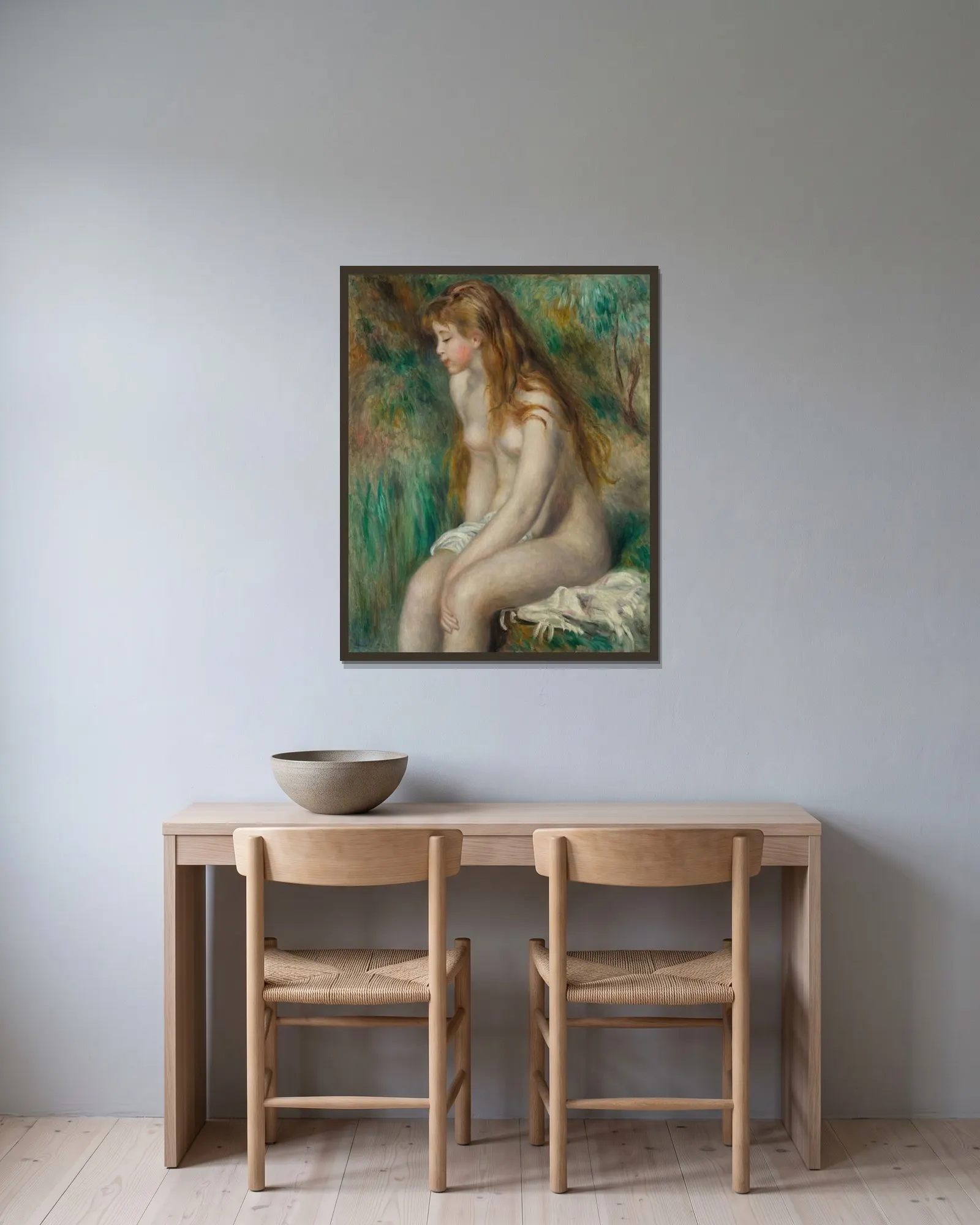 Young Girl Bathing av Pierre-Auguste Renoir inramad på en vägg