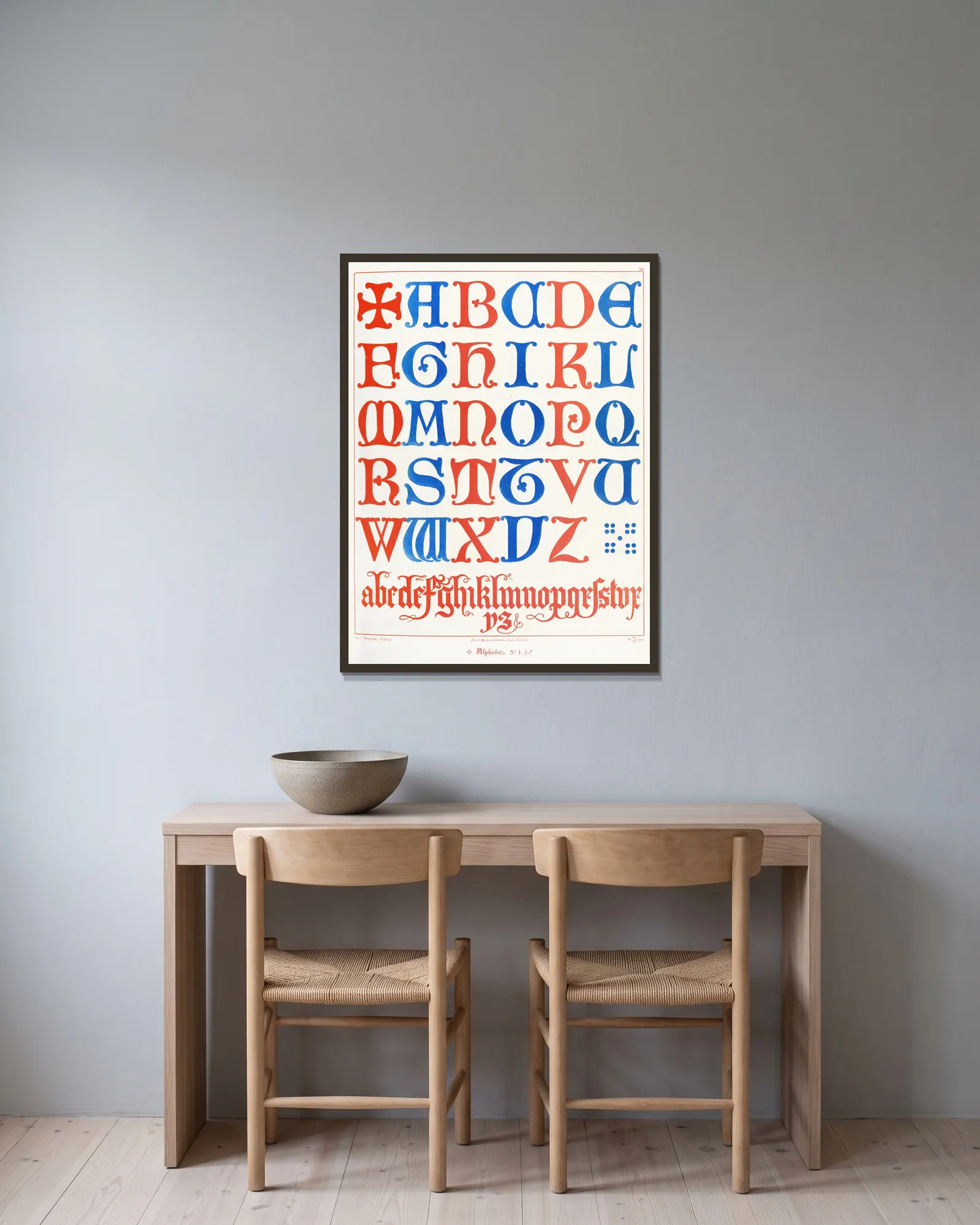 Alphabets av Augustus Pugin inramad på en vägg