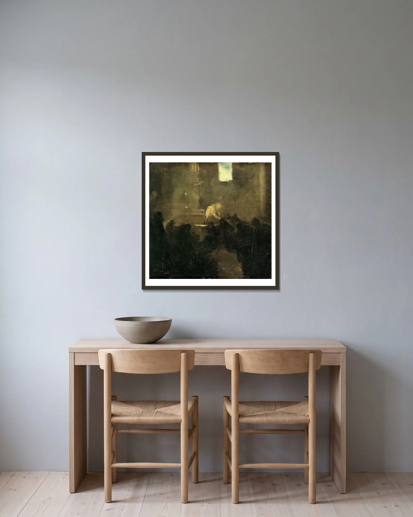 La Communion av Jean-Baptiste Carpeaux inramad på en vägg