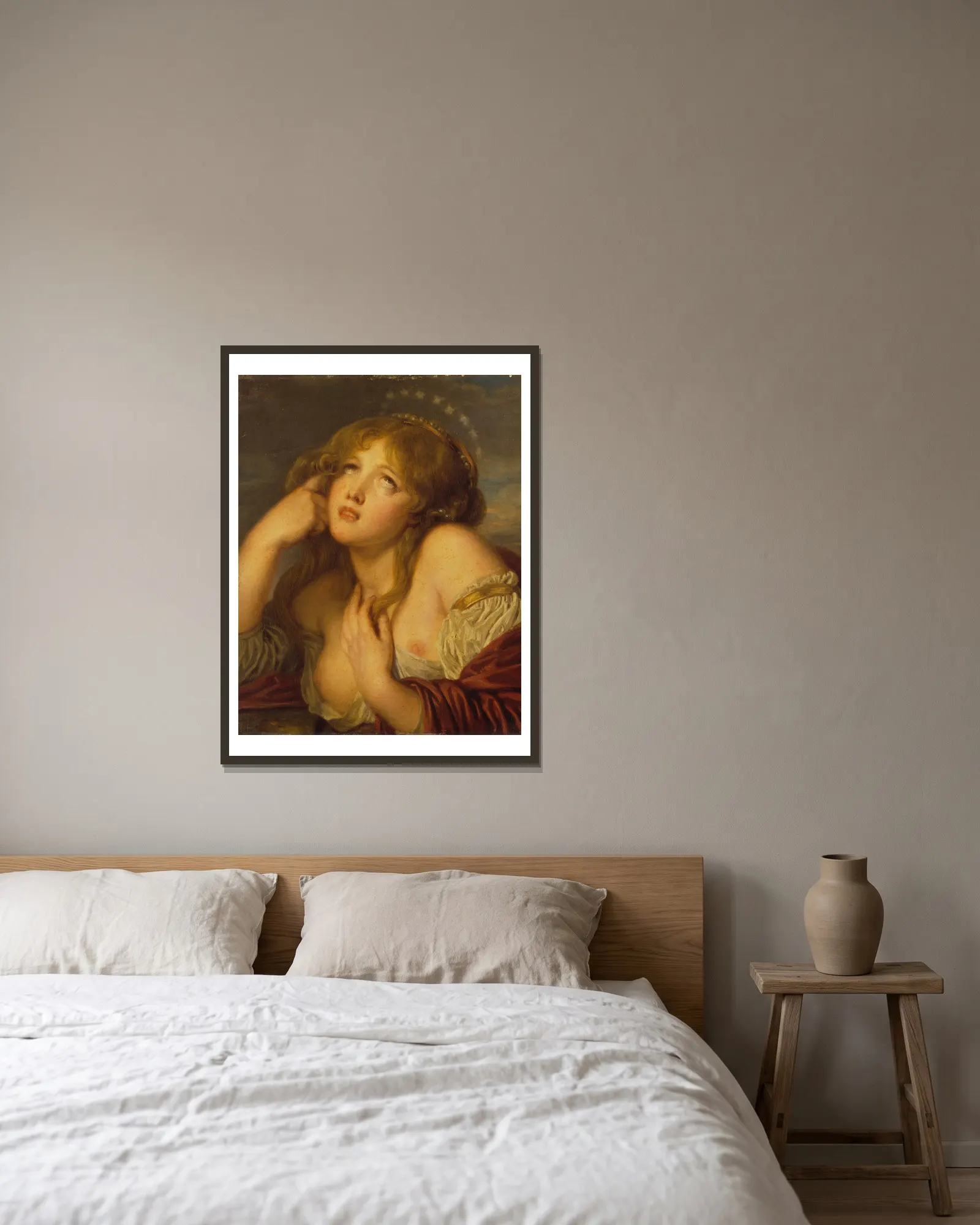 Ariadne av Jean-Baptiste Greuze inramad på en vägg