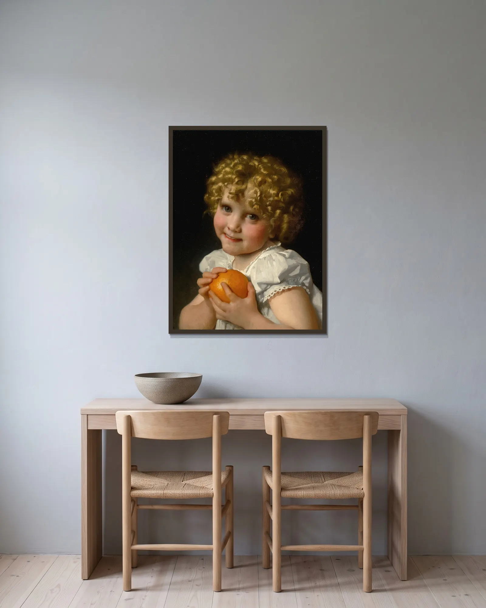 Fillette À L’orange av Léon-Jean-Basile Perrault inramad på en vägg