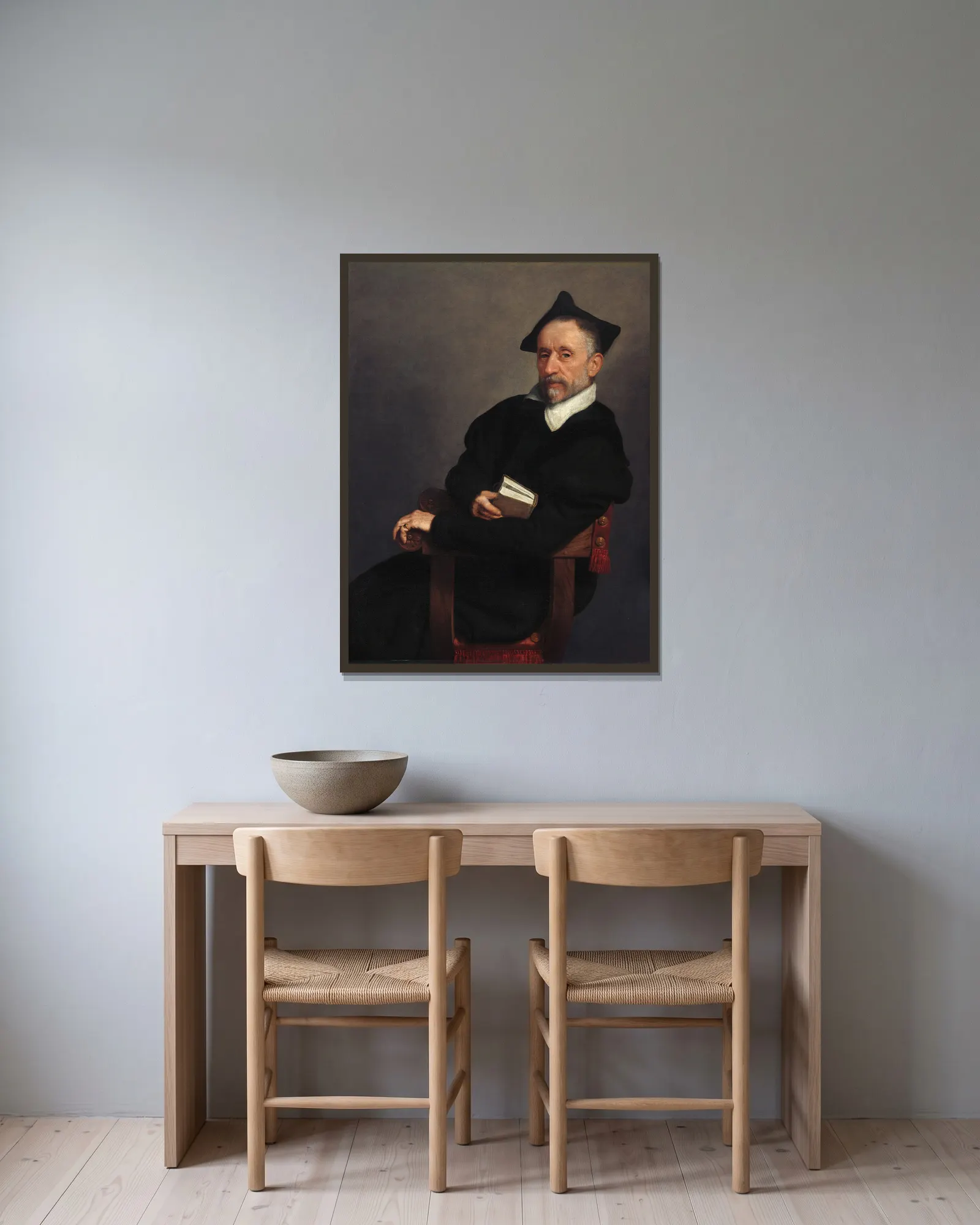 Titian’s Schoolmaster av Giovanni Battista Moroni inramad på en vägg