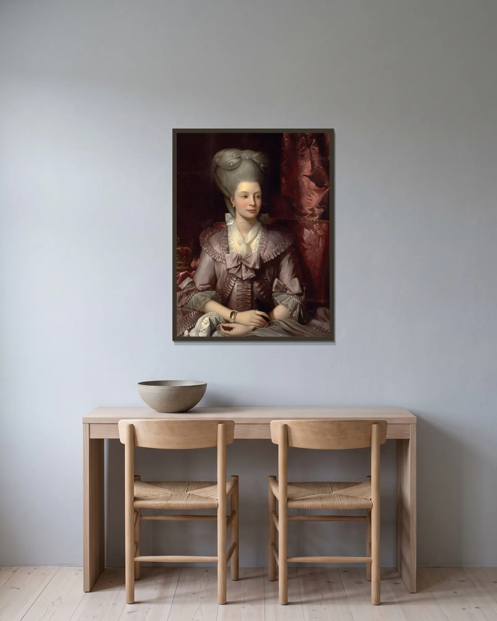 Queen Charlotte av Benjamin West inramad på en vägg