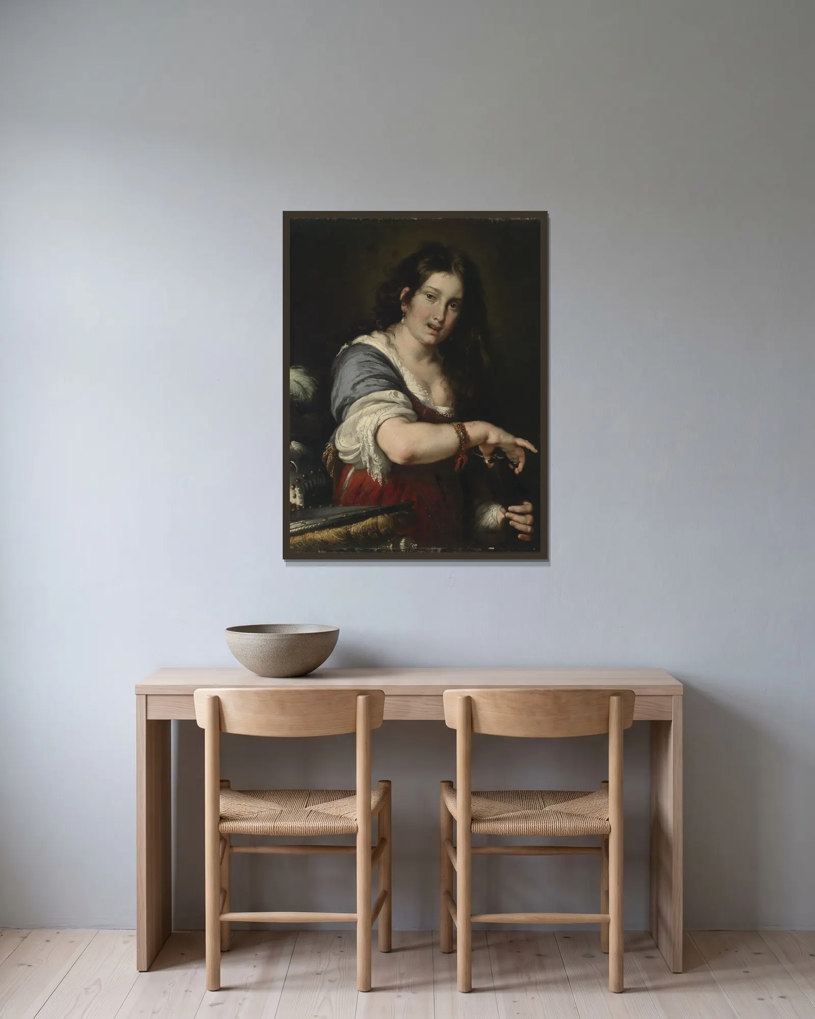 Berenice av Bernardo Strozzi inramad på en vägg