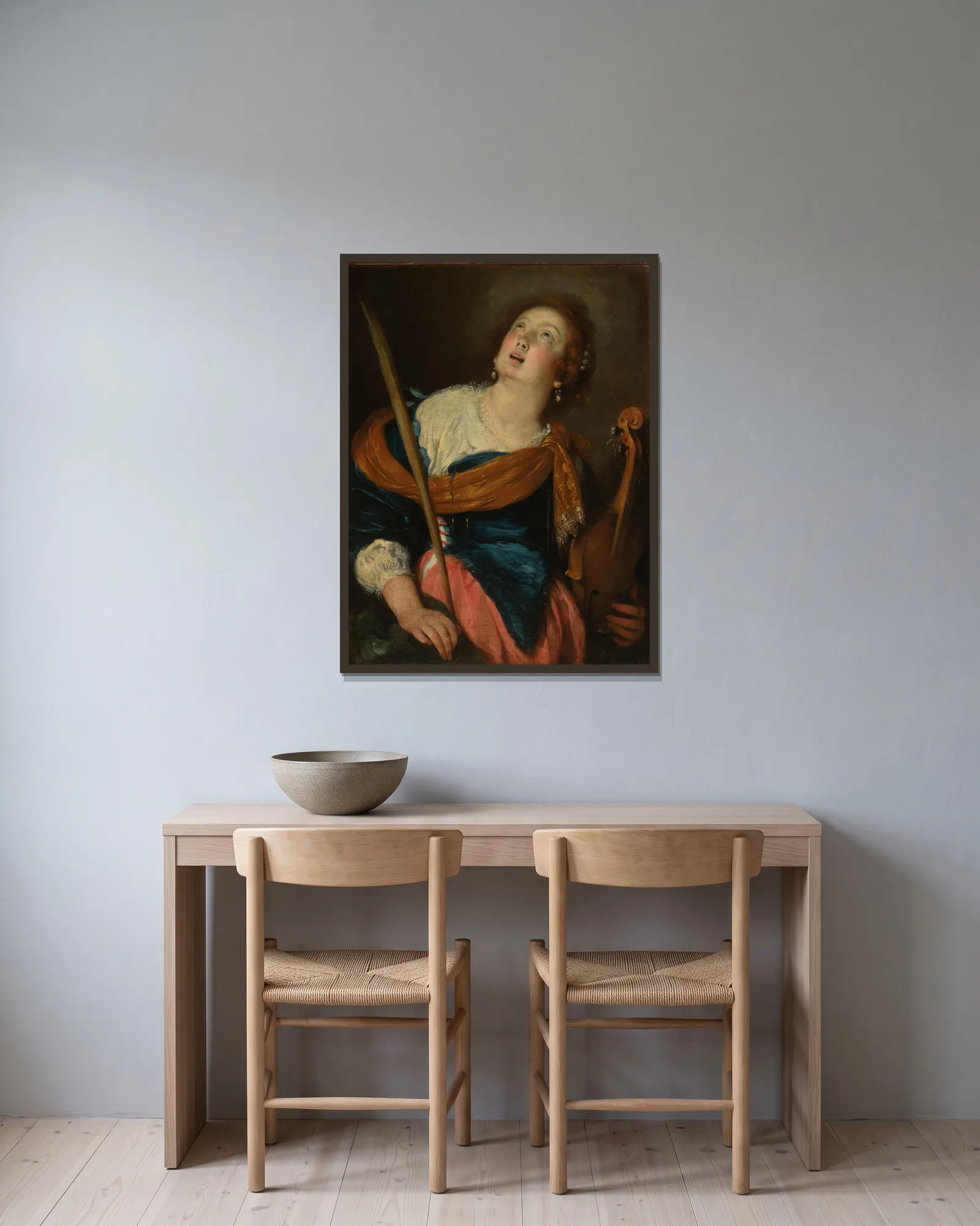 Saint Cecilia av Bernardo Strozzi inramad på en vägg