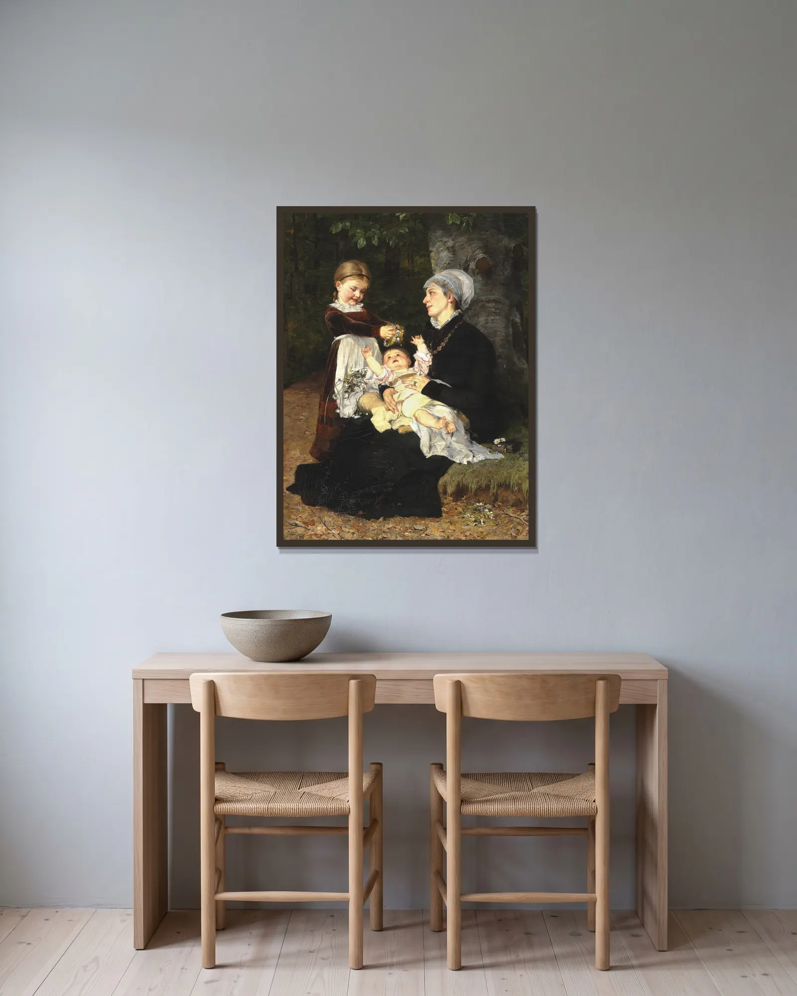 En Ammes Besøg av Bertha Wegmann inramad på en vägg