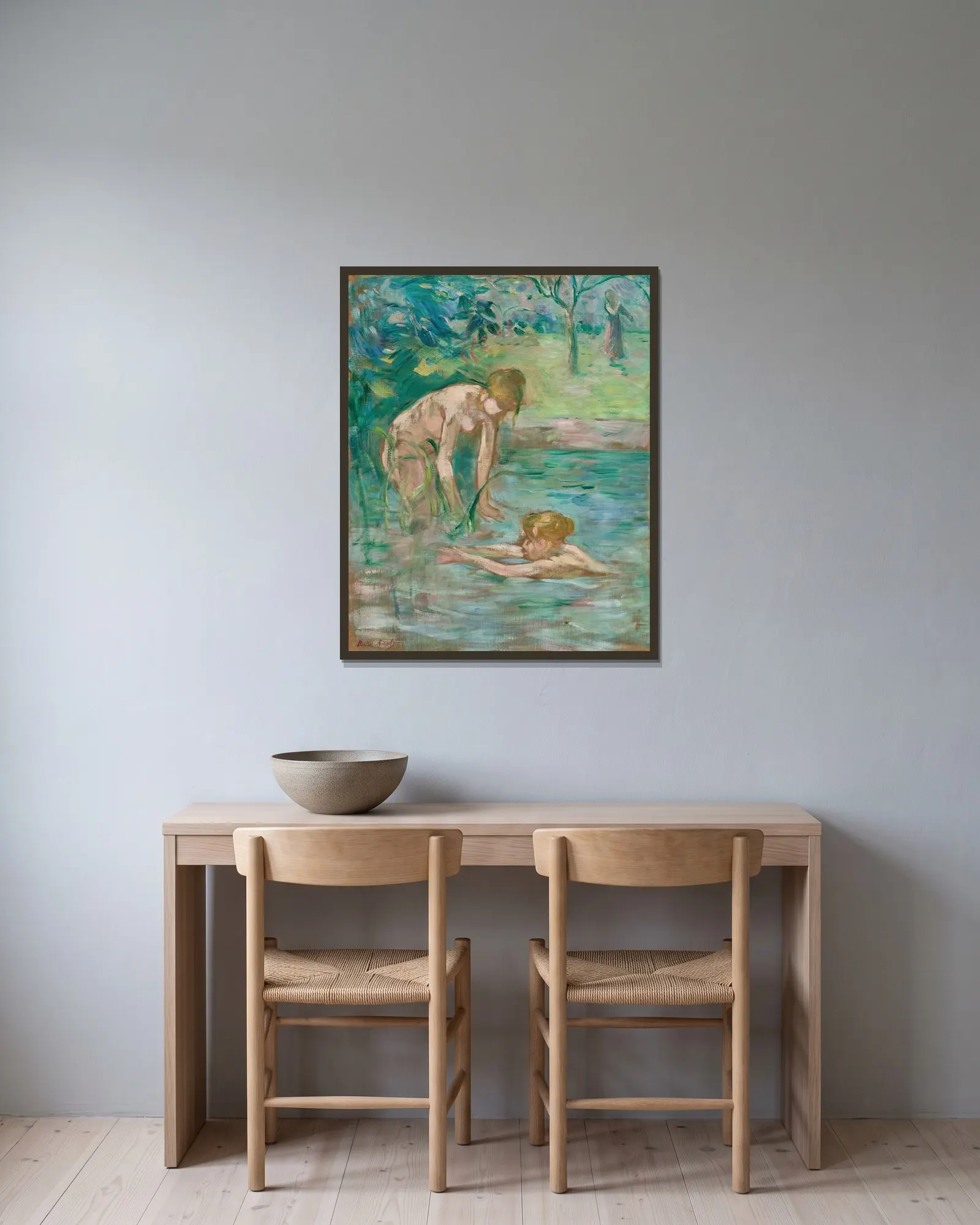 Baigneuses av Berthe Morisot inramad på en vägg