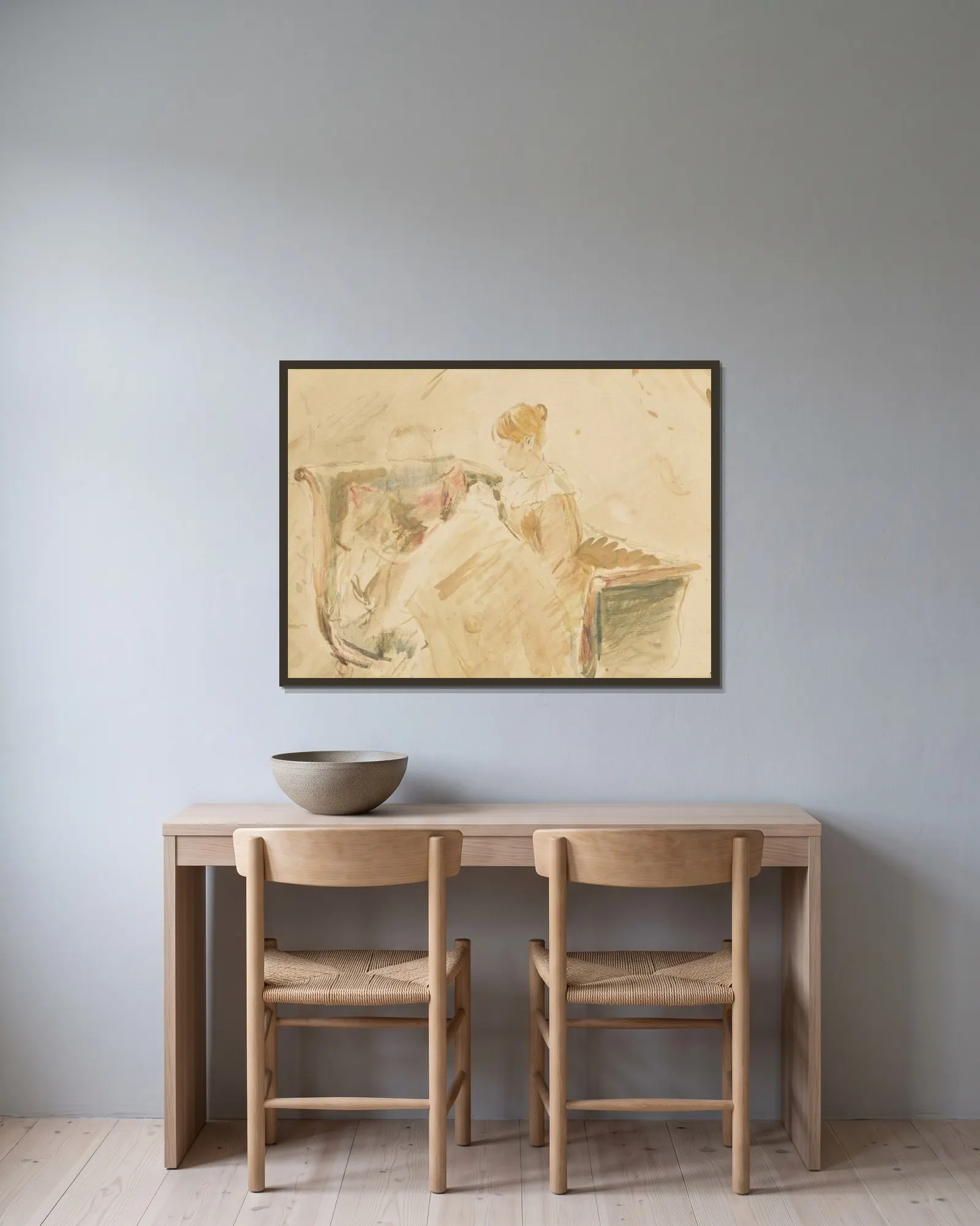 La Broderie av Berthe Morisot inramad på en vägg