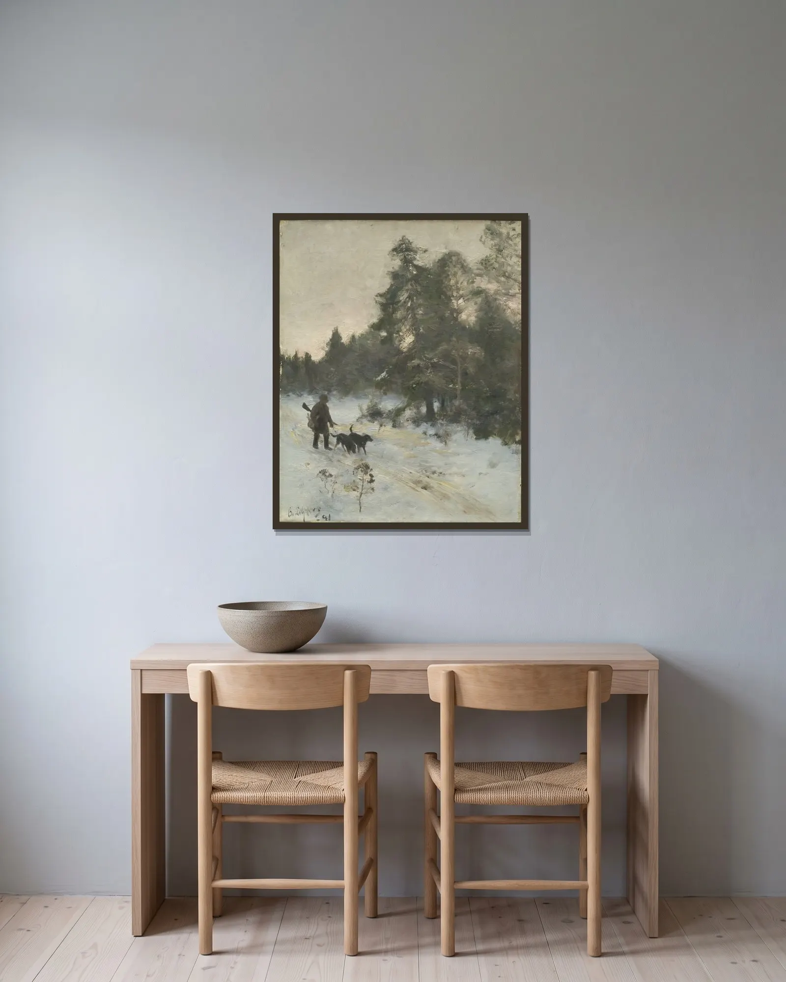 The Hunter av Bruno Liljefors inramad på en vägg