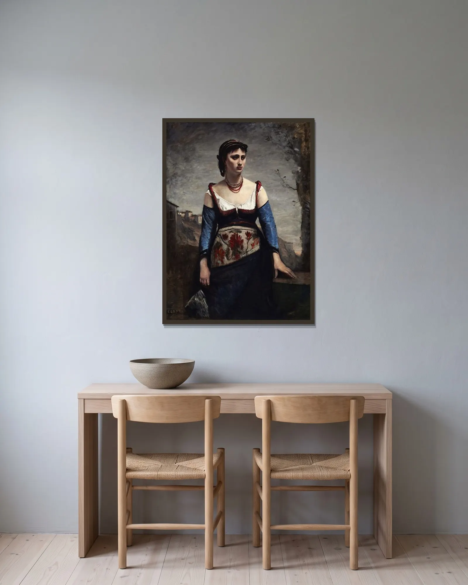 Agostina av Jean-Baptiste-Camille Corot inramad på en vägg