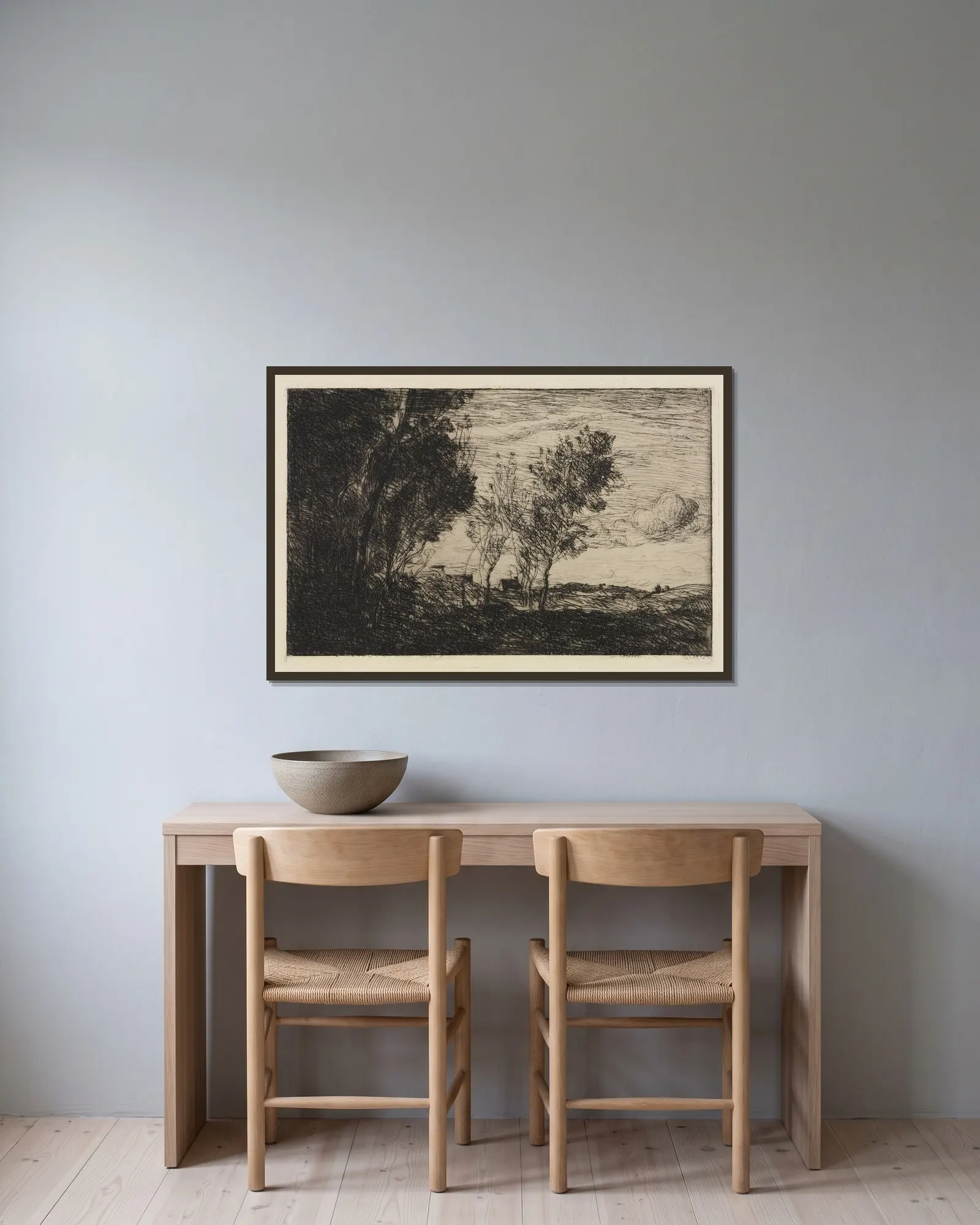 In den Dünen av Jean-Baptiste-Camille Corot inramad på en vägg