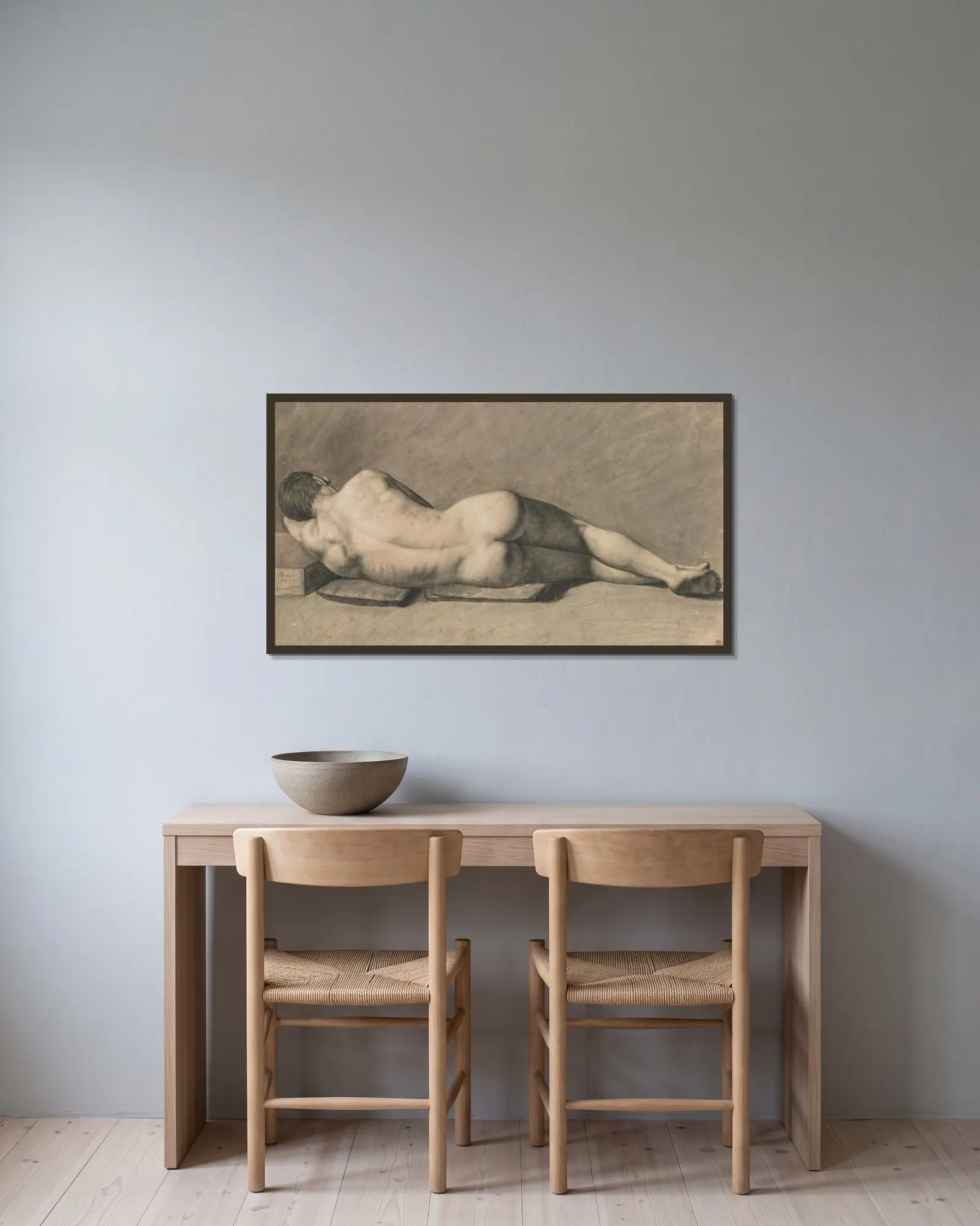 Nu D’homme av Jean-Baptiste-Camille Corot inramad på en vägg
