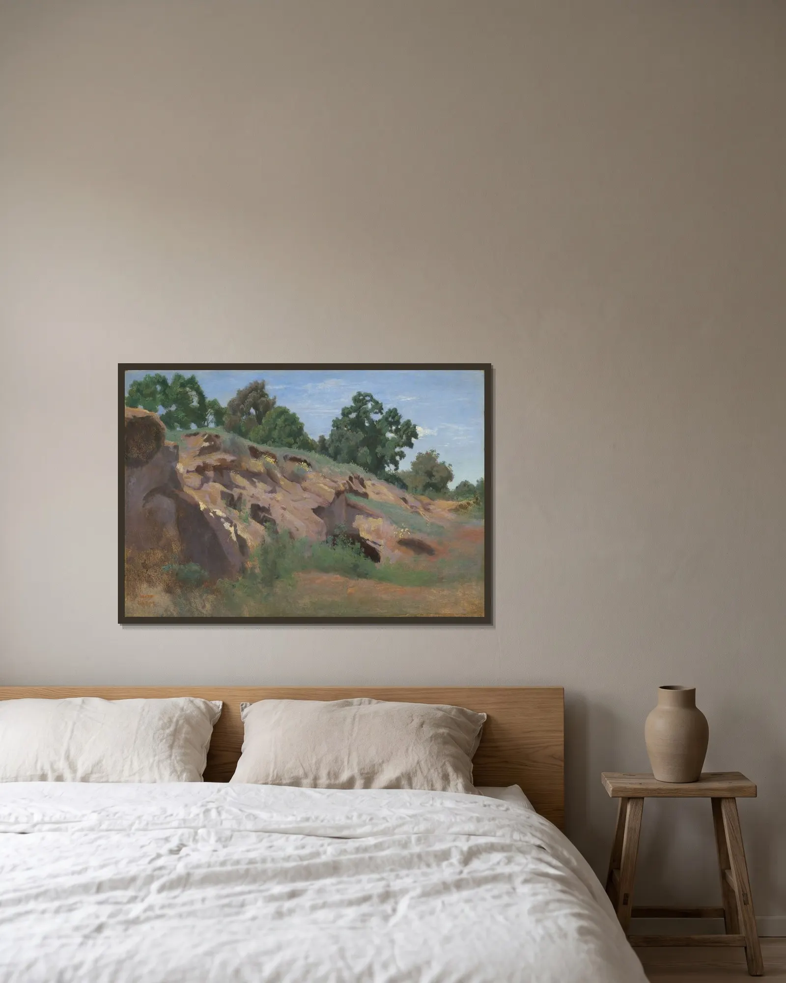 Versant rocheux av Jean-Baptiste-Camille Corot inramad på en vägg