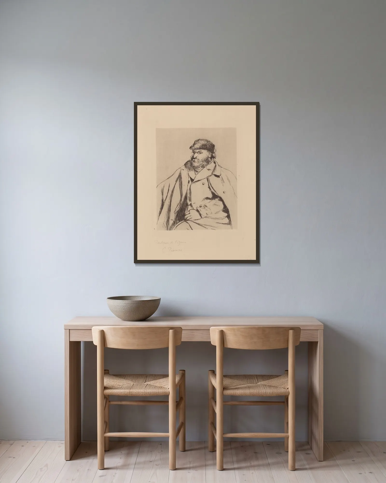 Portrait de Cézanne av Camille Pissarro inramad på en vägg