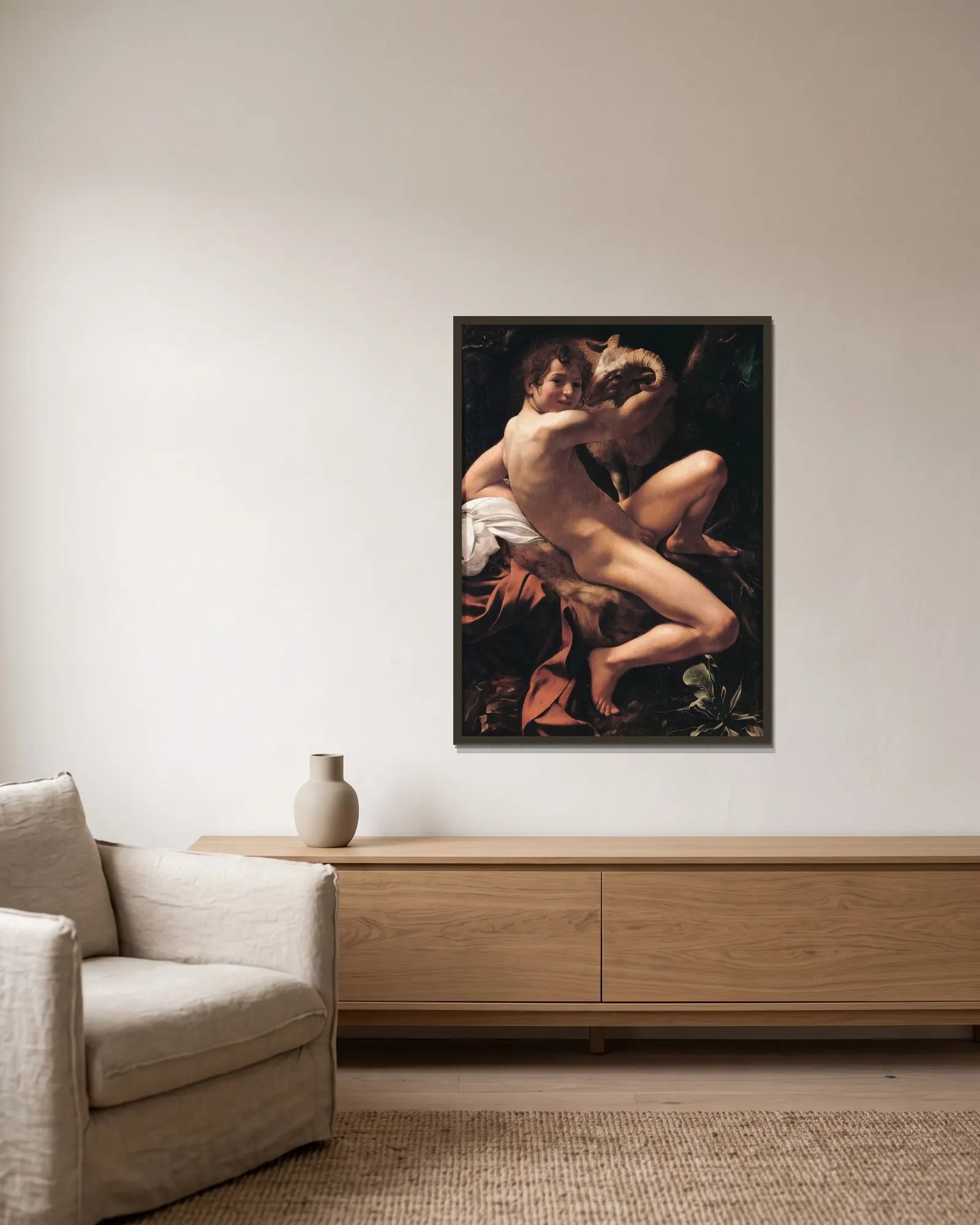 Saint John the Baptist, 1602 av Caravaggio inramad på en vägg
