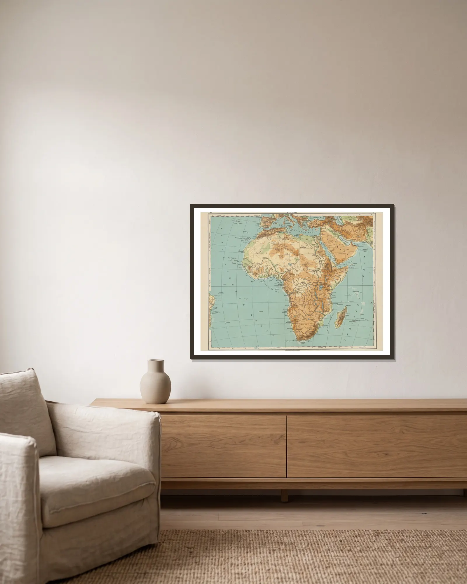 Afrika av Carl Diercke inramad på en vägg