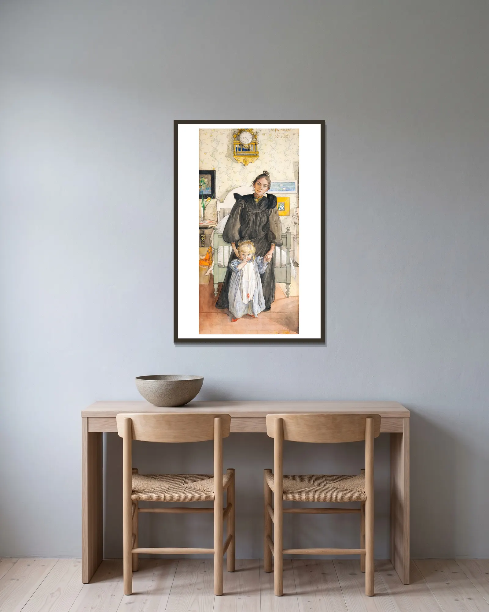 Karin och Kersti av Carl Larsson inramad på en vägg