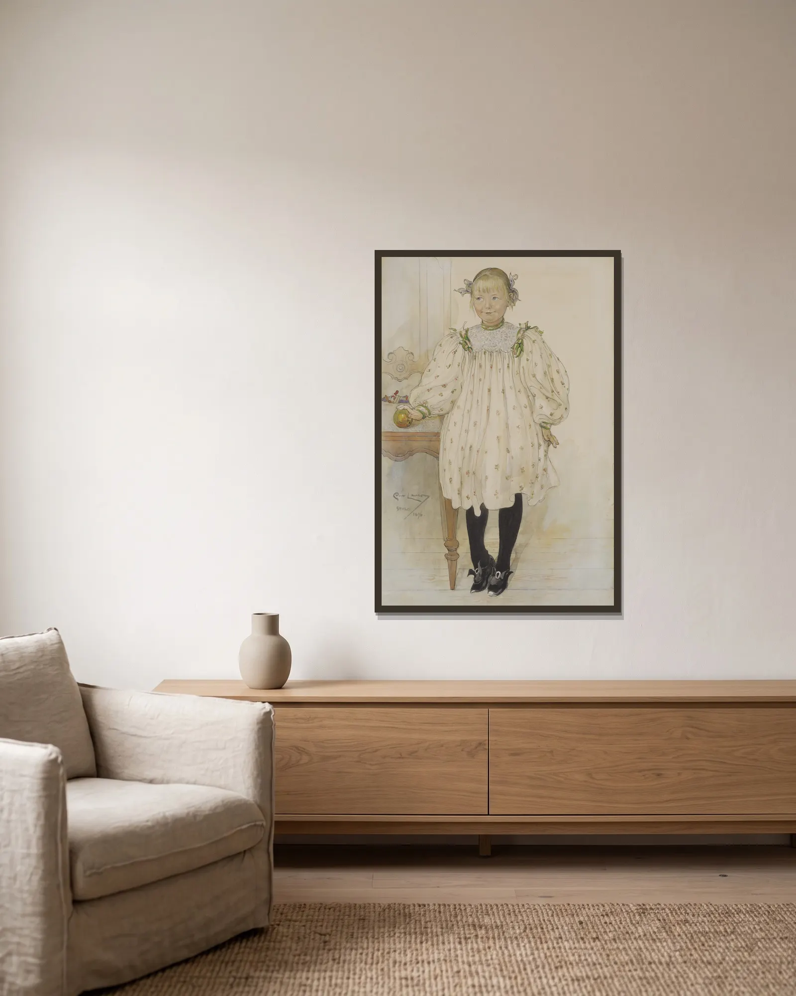 Martha Winslow av Carl Larsson inramad på en vägg