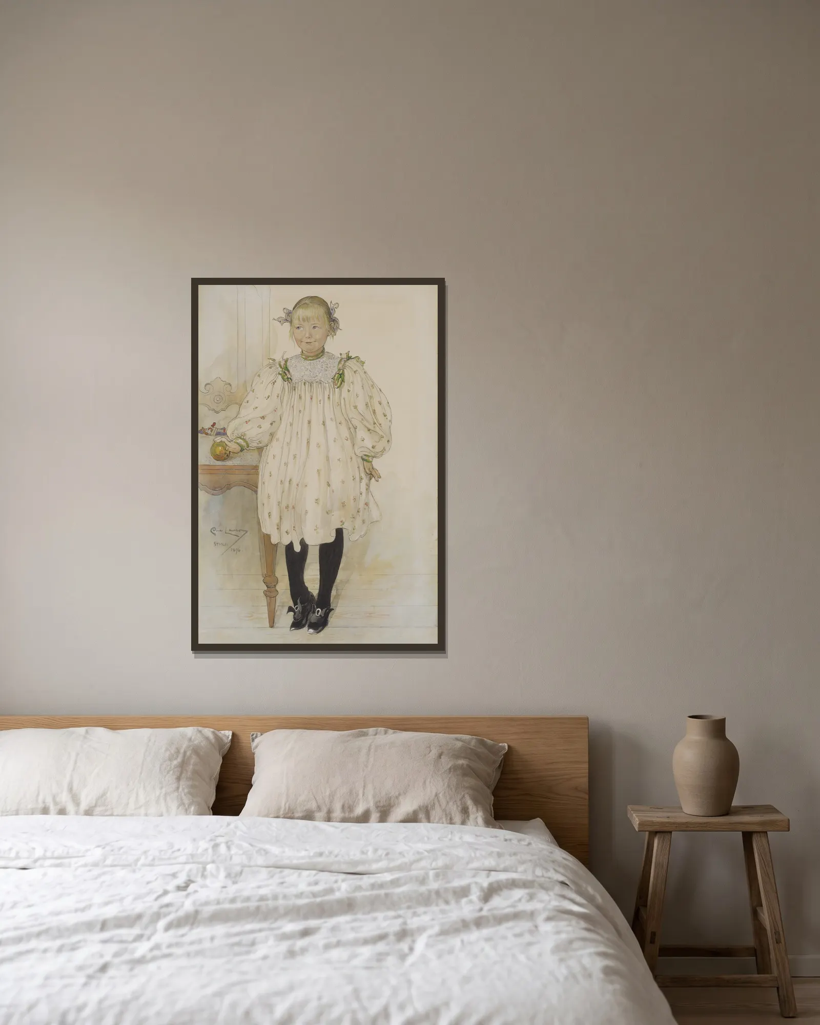 Martha Winslow av Carl Larsson inramad på en vägg