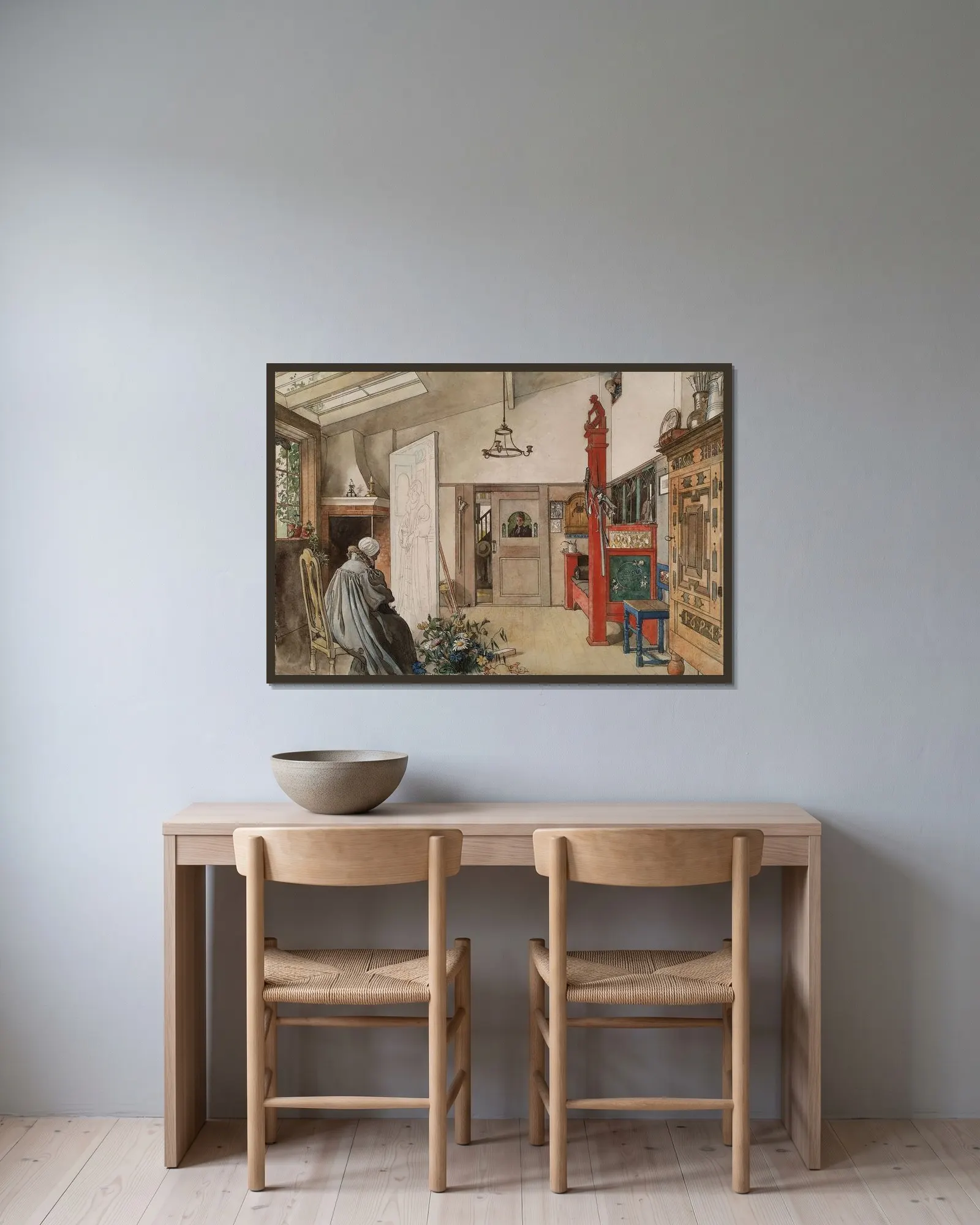 The Studio av Carl Larsson inramad på en vägg