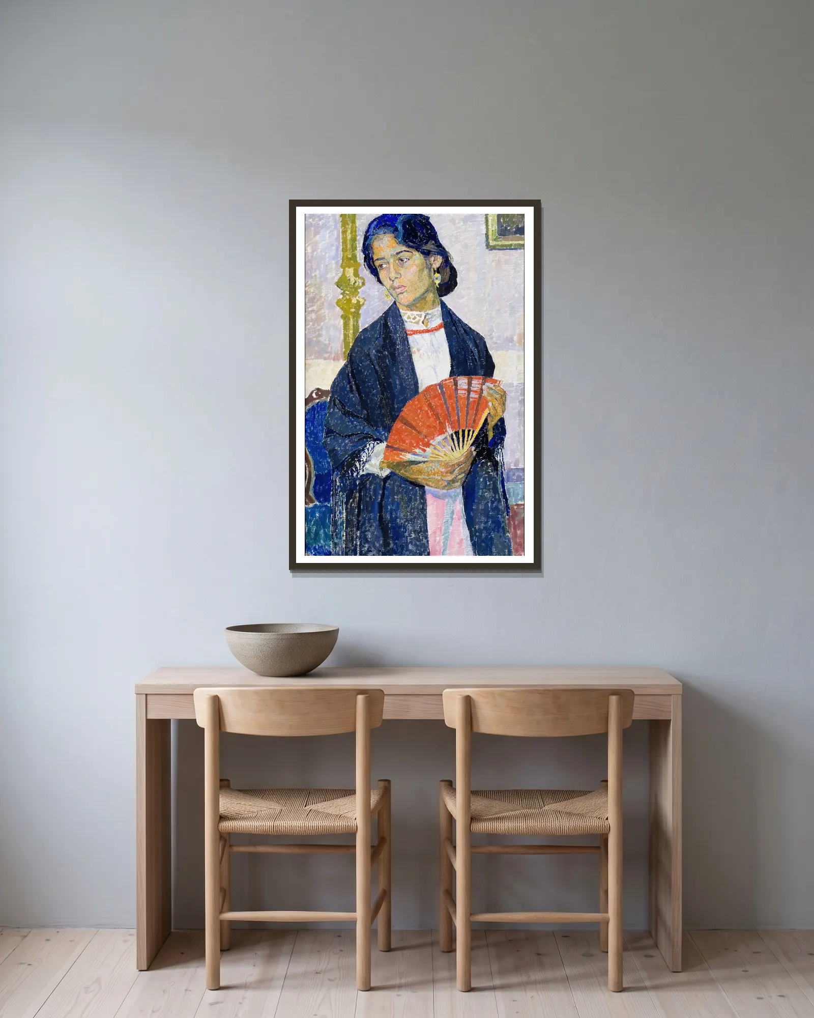 Gitanilla av Carl Wilhelmson inramad på en vägg