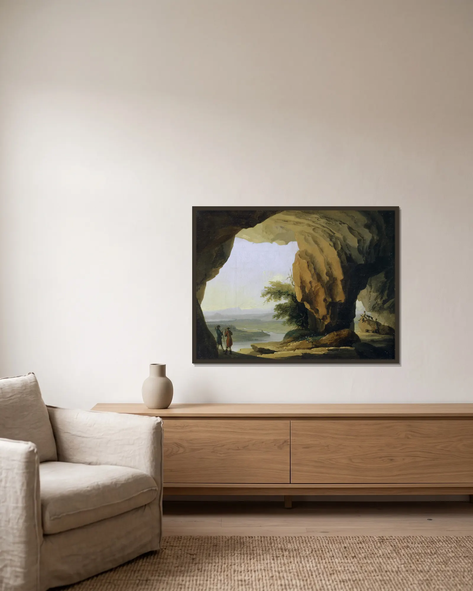 Landscape with Beatus Cave av Caspar Wolf inramad på en vägg