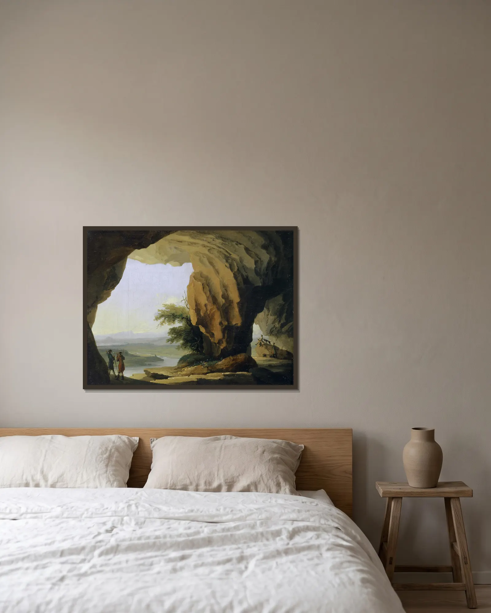 Landscape with Beatus Cave av Caspar Wolf inramad på en vägg