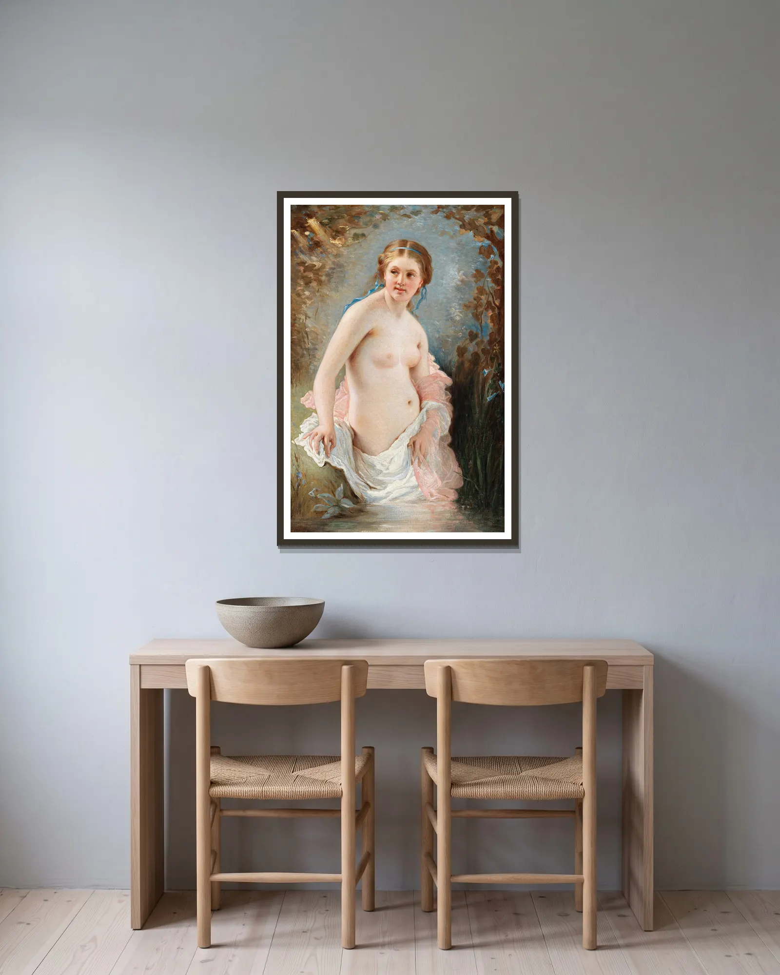 A Woman Bathing av Charles Chaplin inramad på en vägg