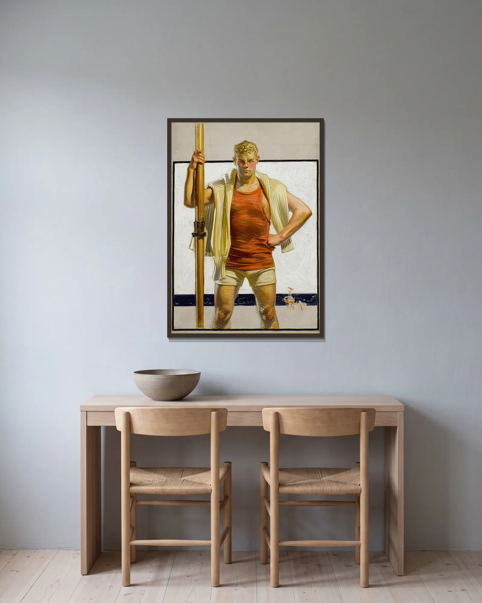 The Oarsman av Joseph Christian Leyendecker inramad på en vägg