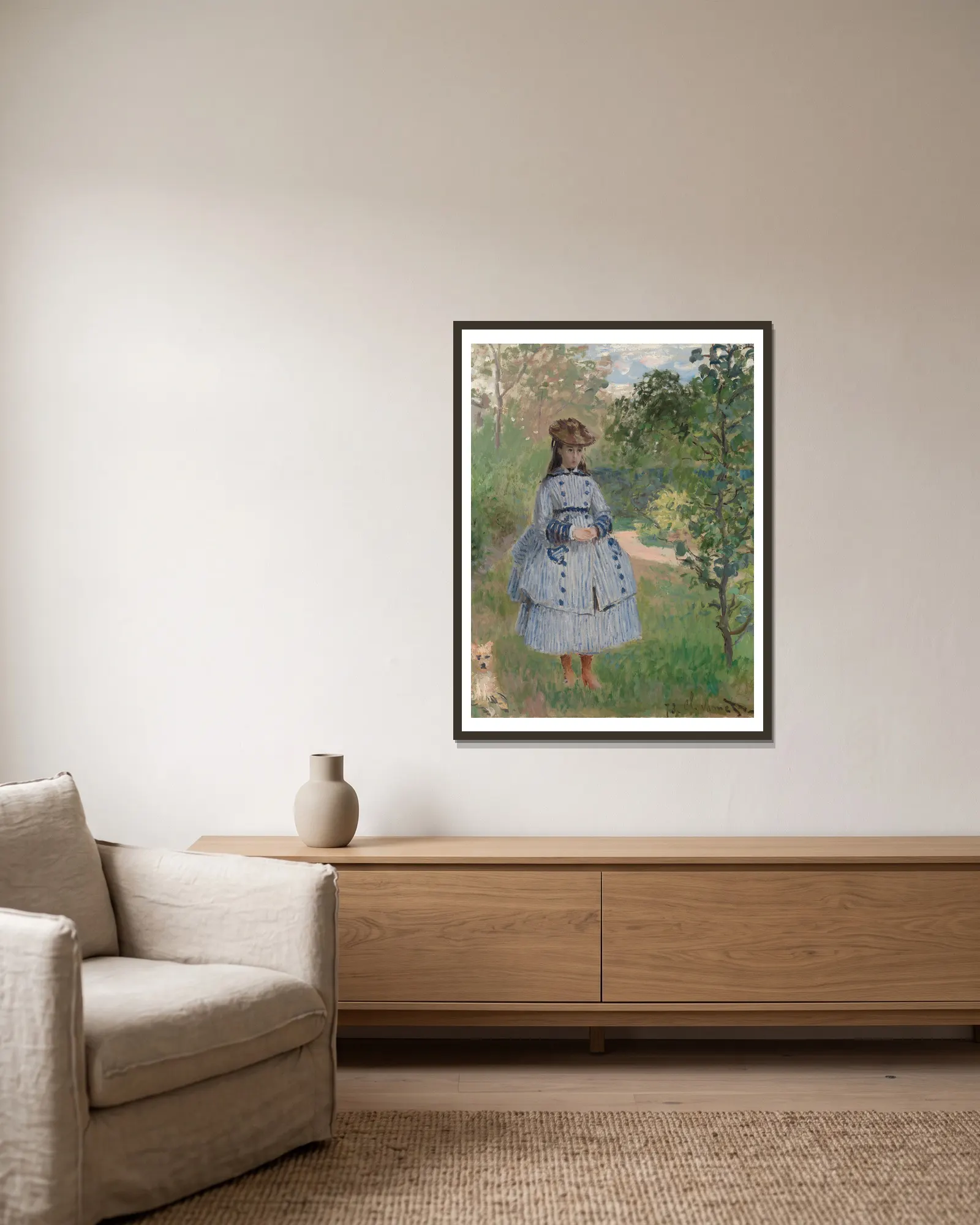 Girl with Dog av Claude Monet inramad på en vägg