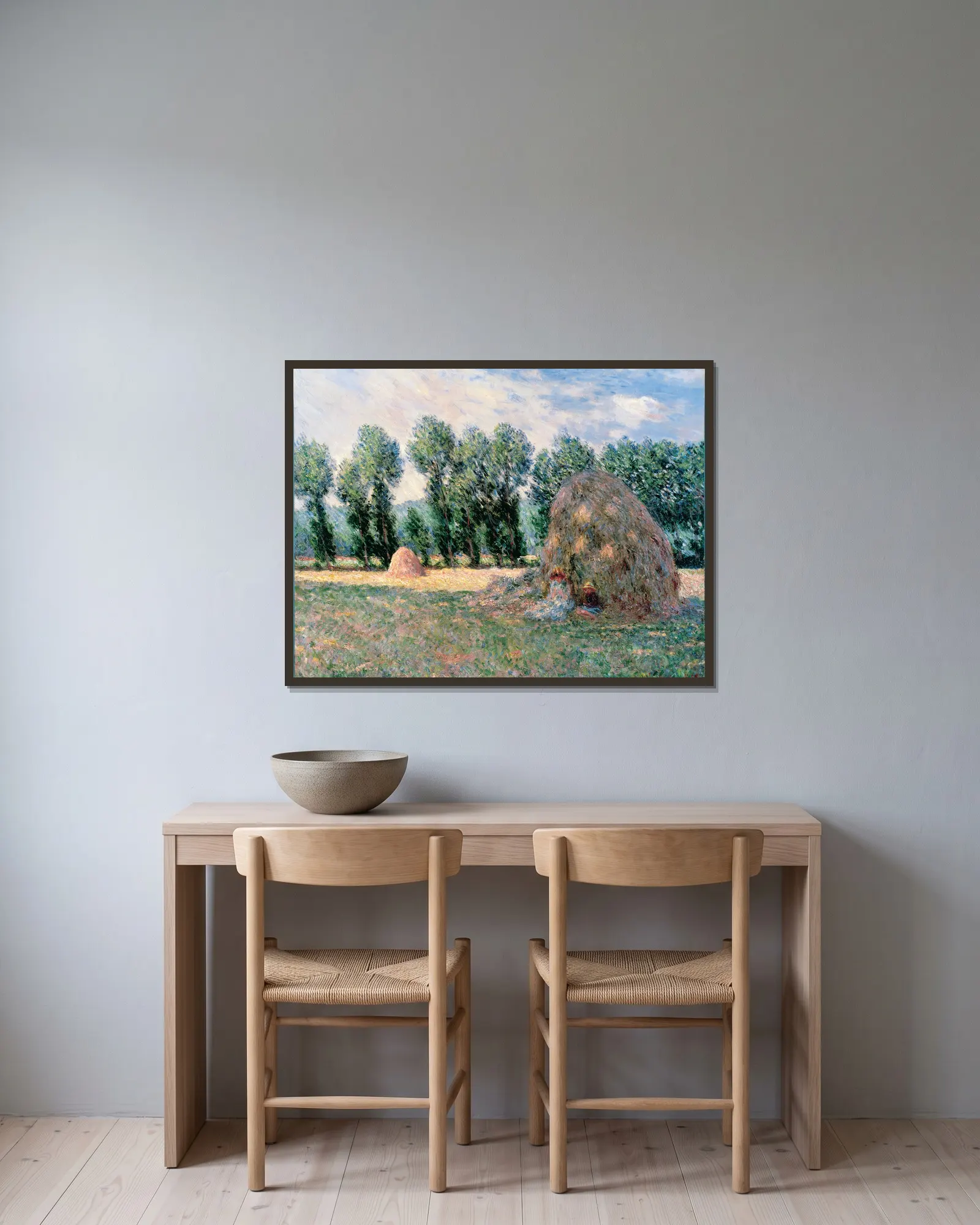 Haystacks av Claude Monet inramad på en vägg