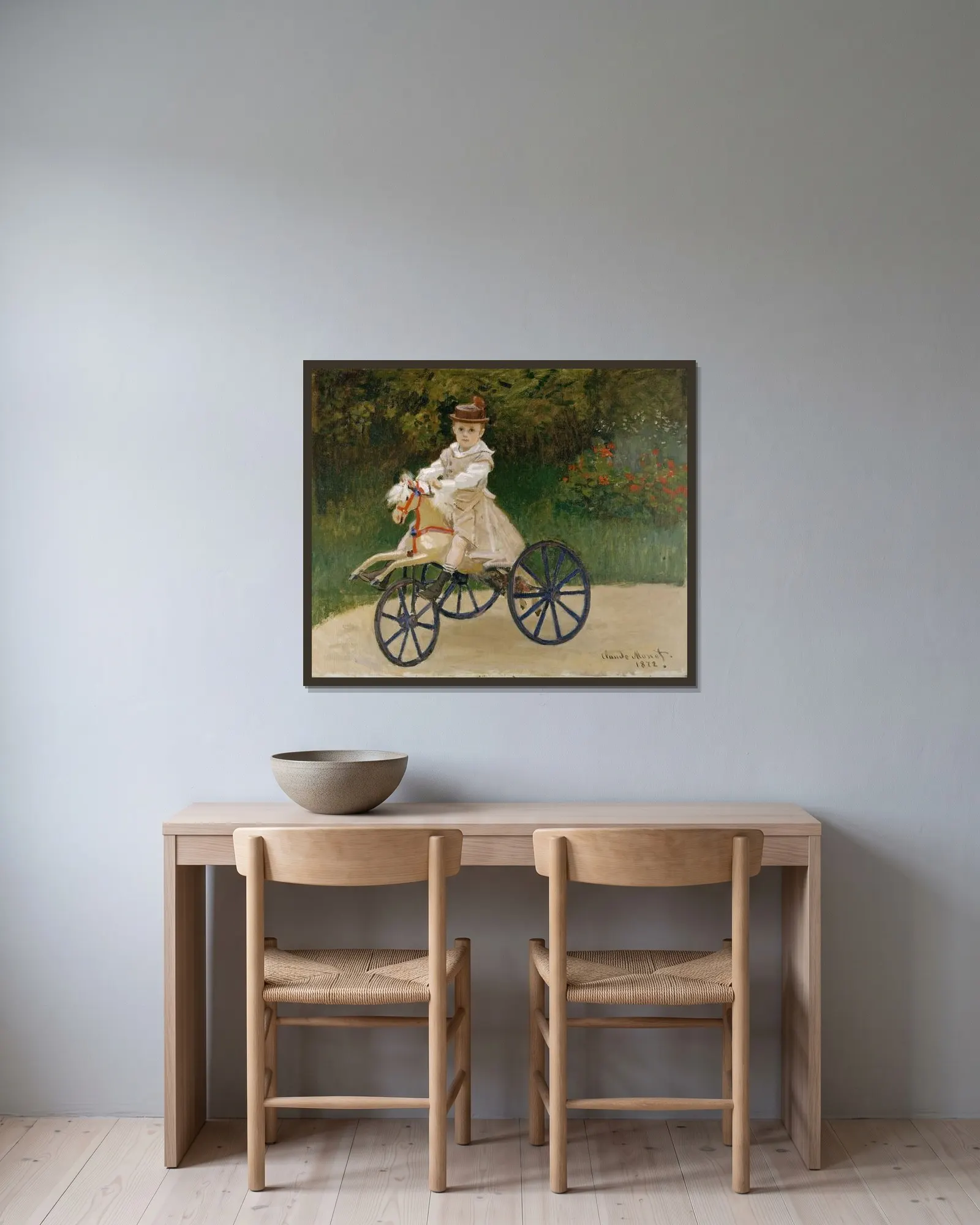 Jean Monet av Claude Monet inramad på en vägg