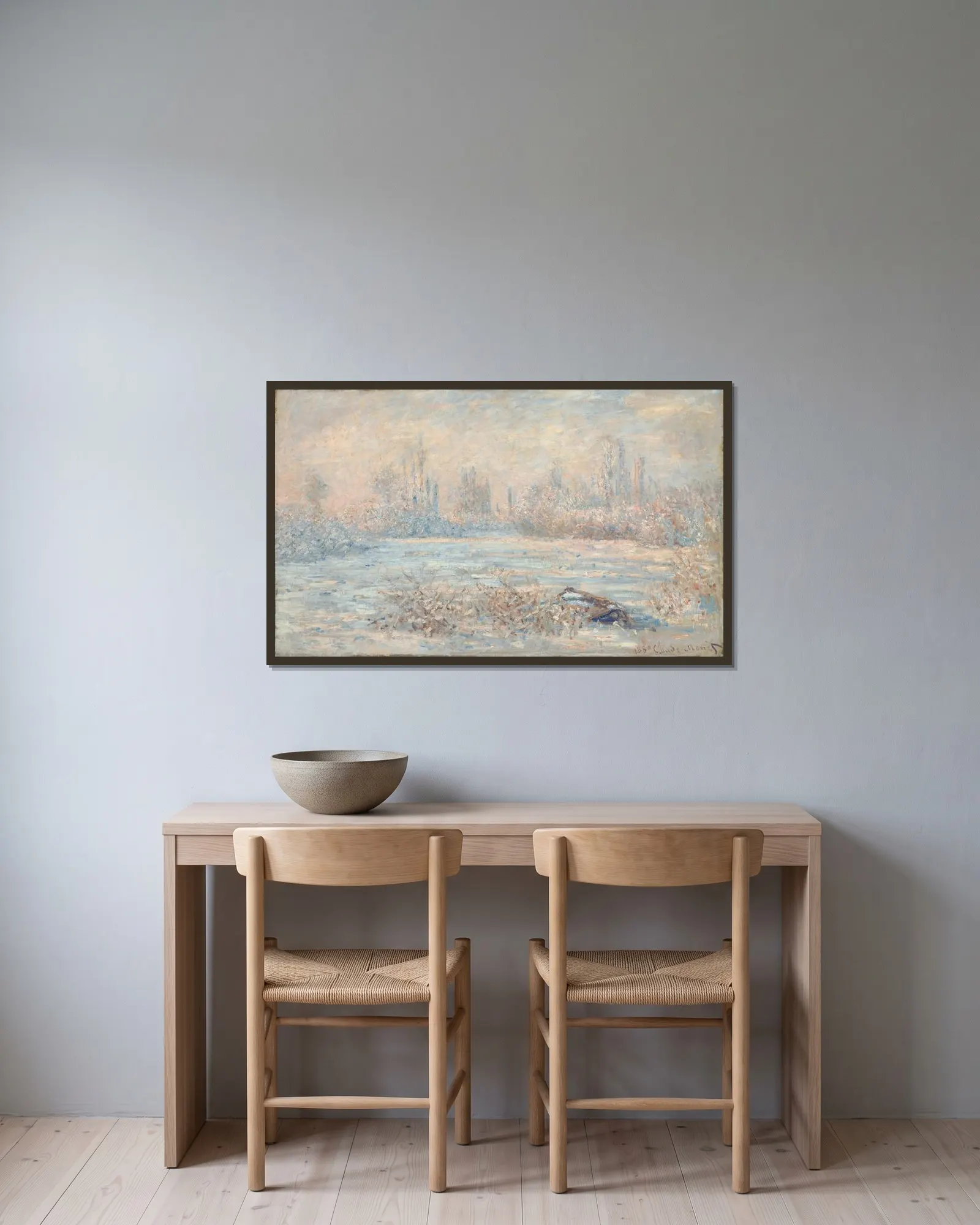 Le Givre av Claude Monet inramad på en vägg