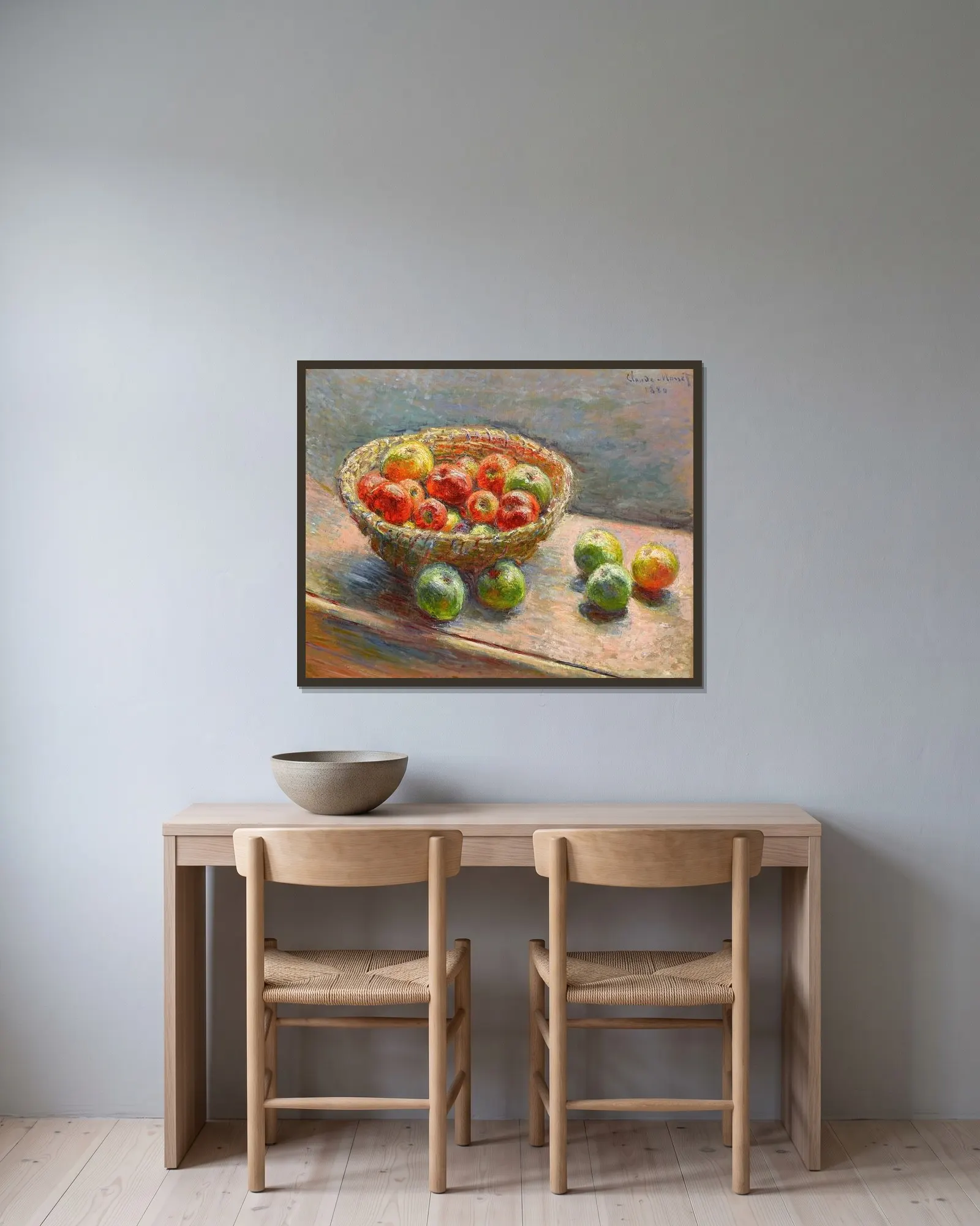 Le panier de pommes av Claude Monet inramad på en vägg