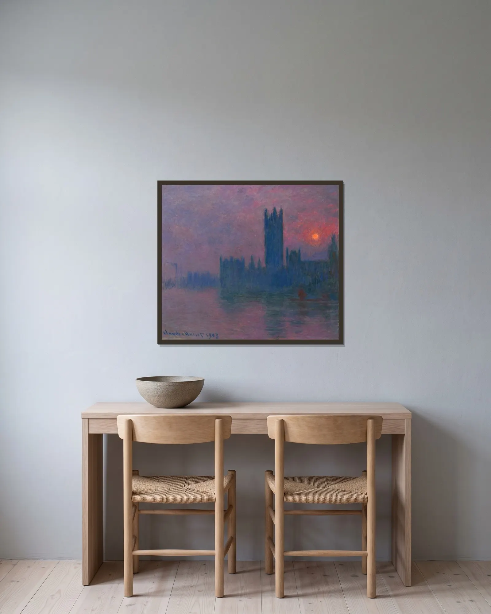 Le Parlement, soleil couchant av Claude Monet inramad på en vägg