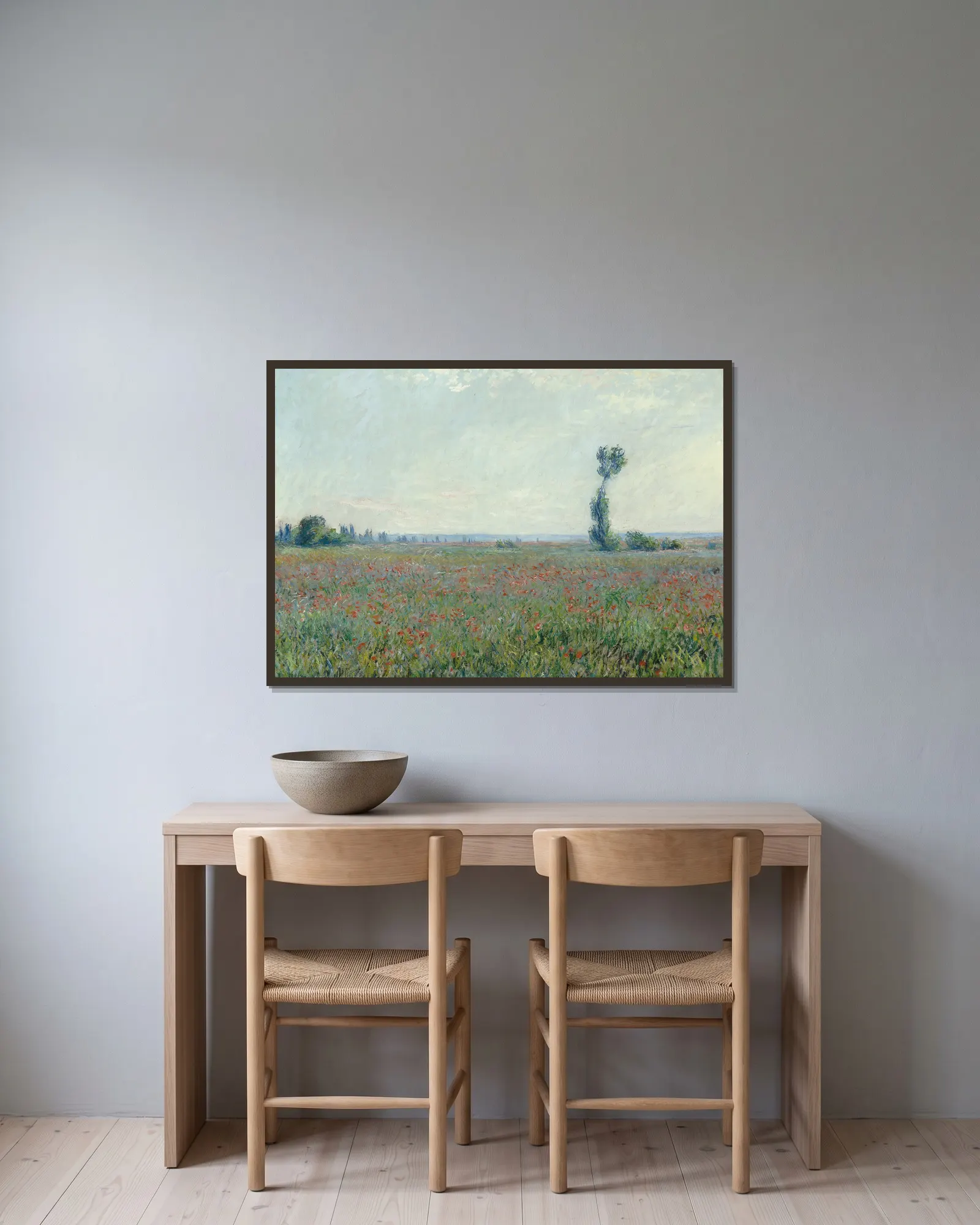 Poppy Field 2 av Claude Monet inramad på en vägg