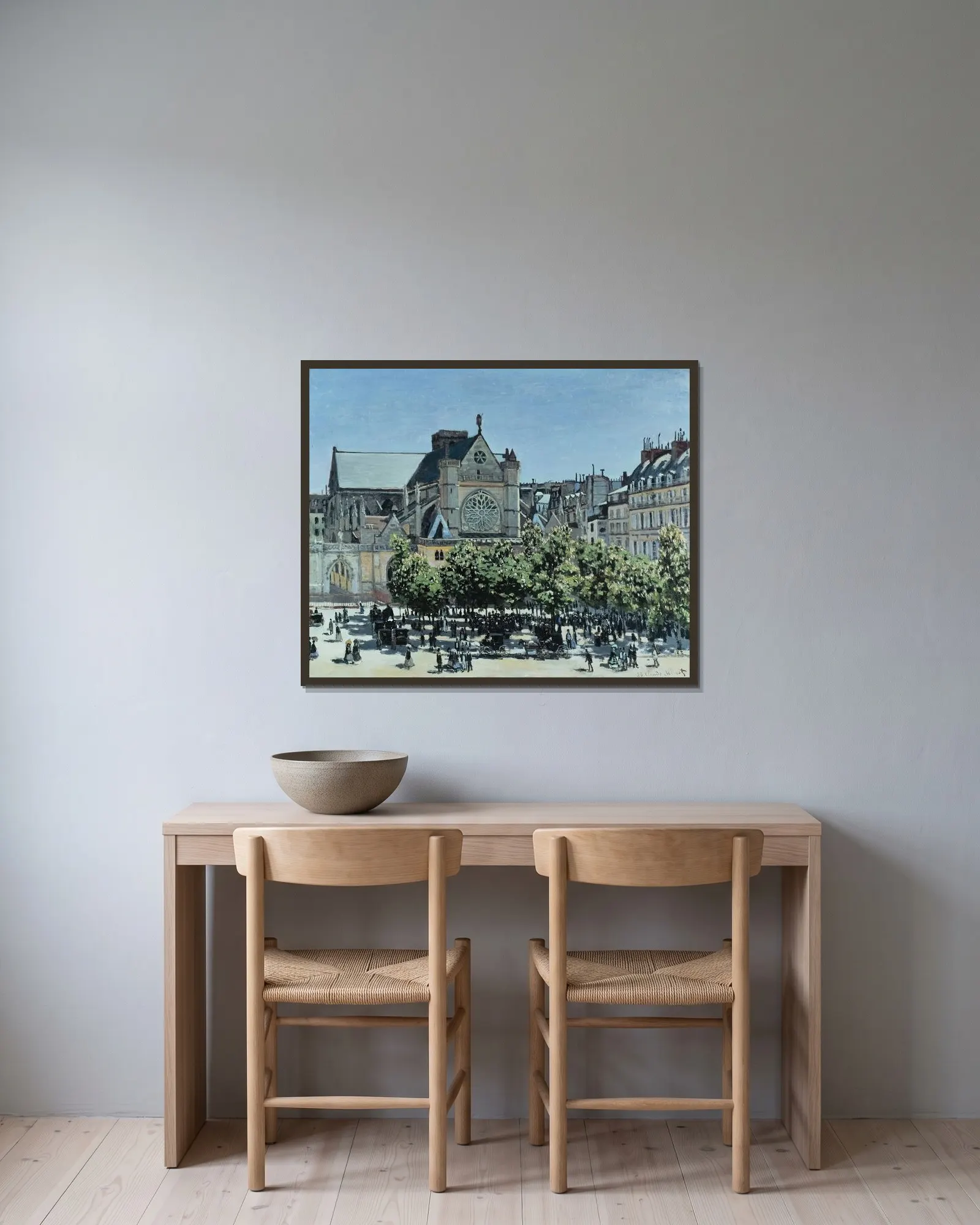 St. Germain l’Auxerrois av Claude Monet inramad på en vägg
