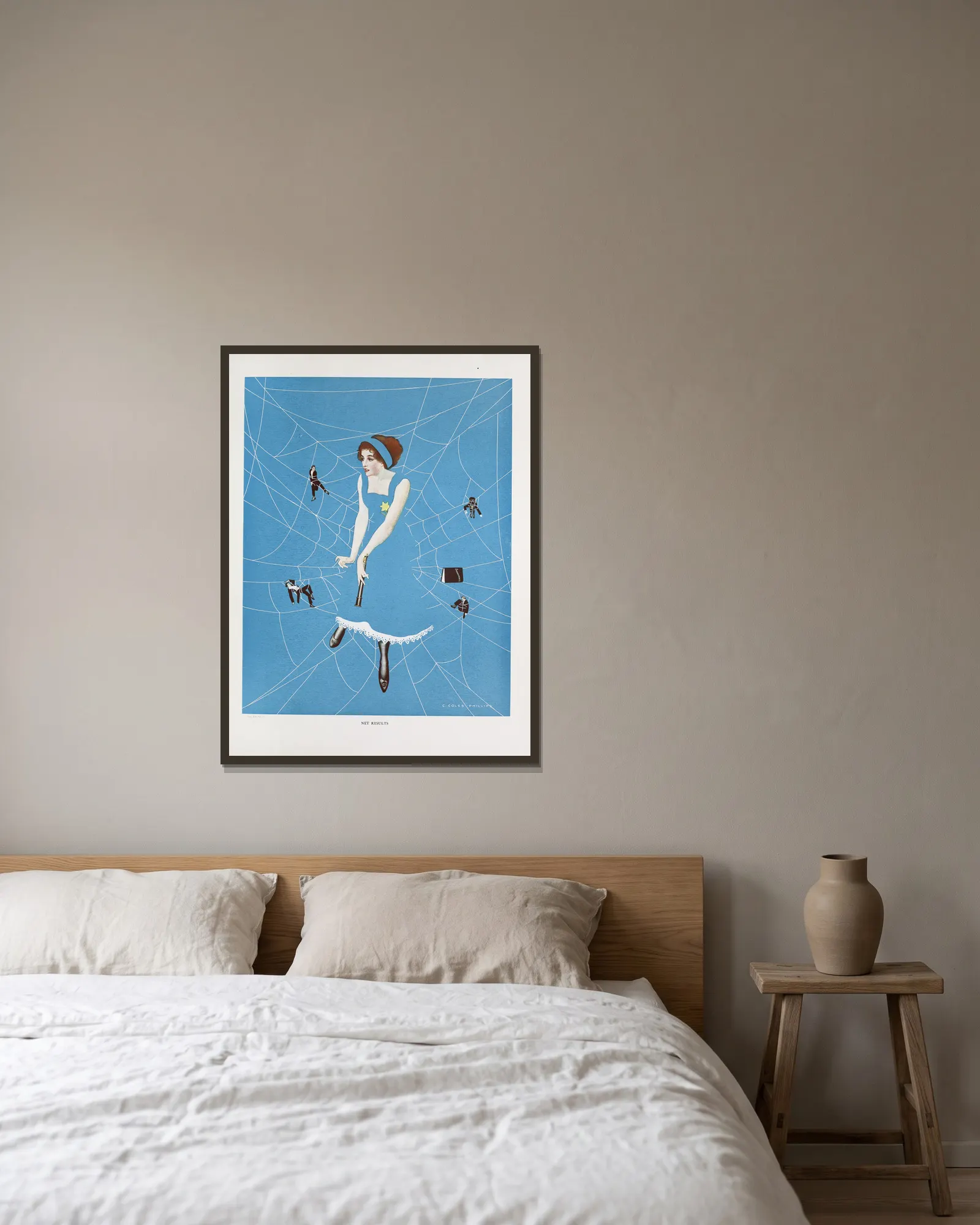 Net results av Coles Phillips inramad på en vägg