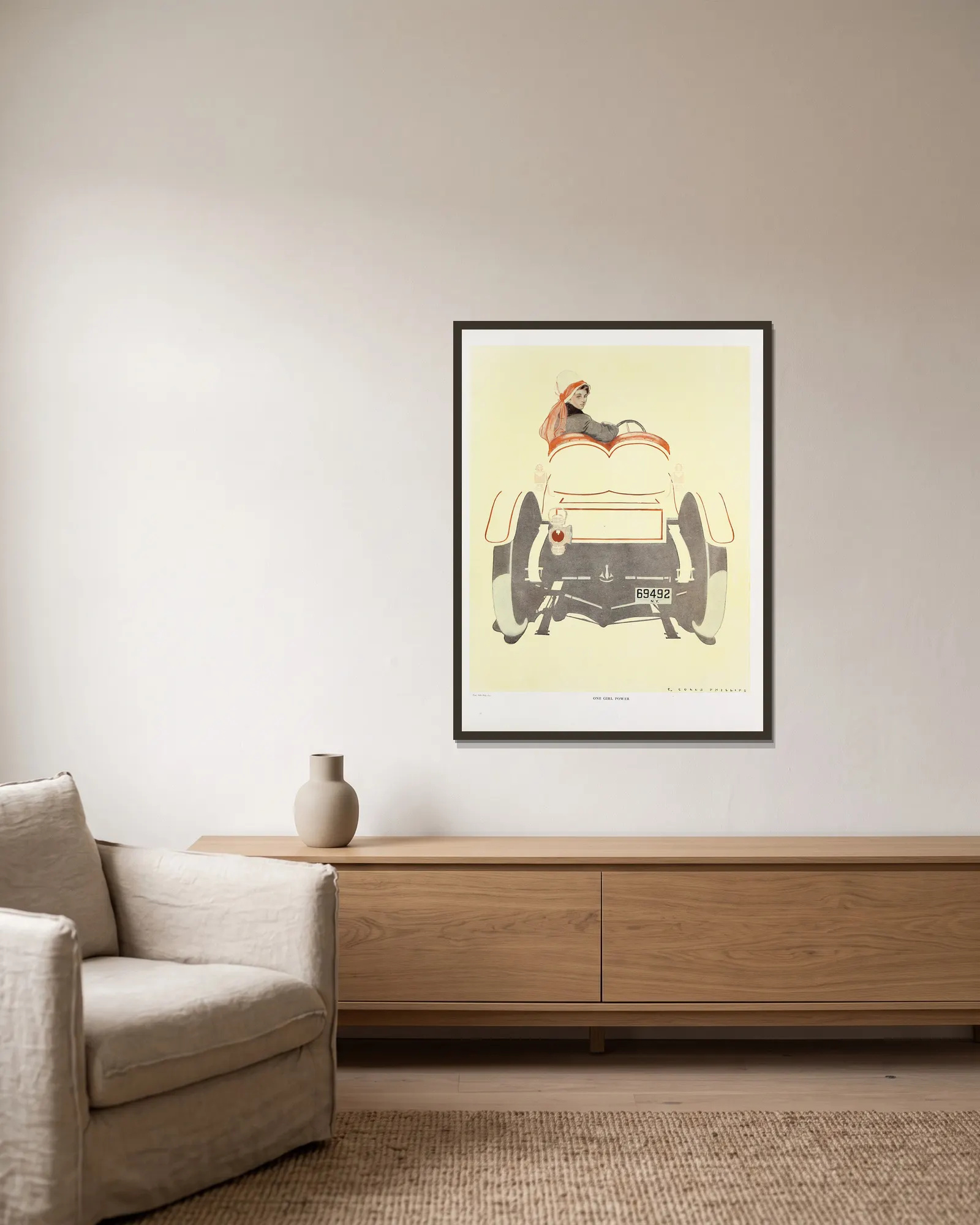 One girl power av Coles Phillips inramad på en vägg