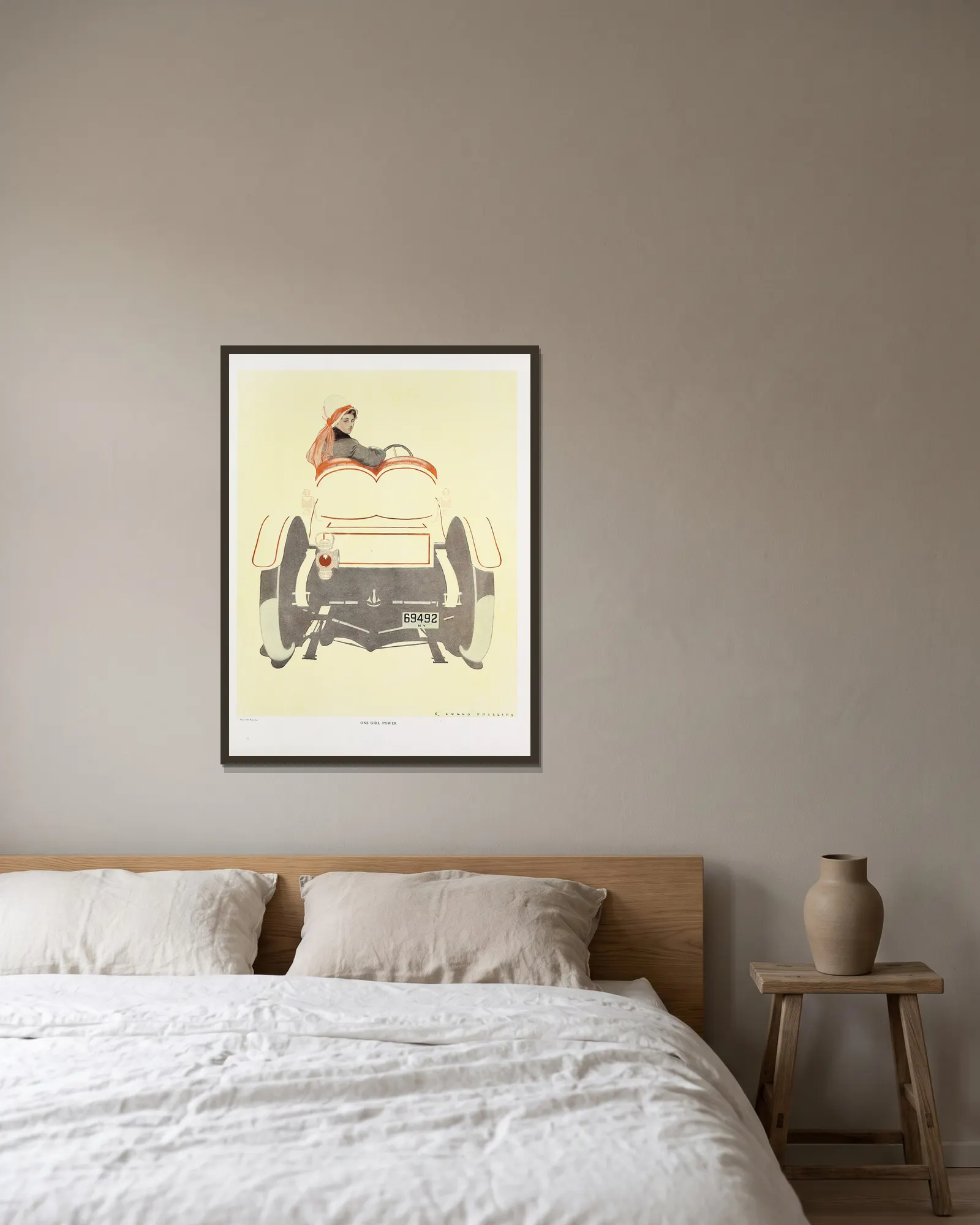 One girl power av Coles Phillips inramad på en vägg