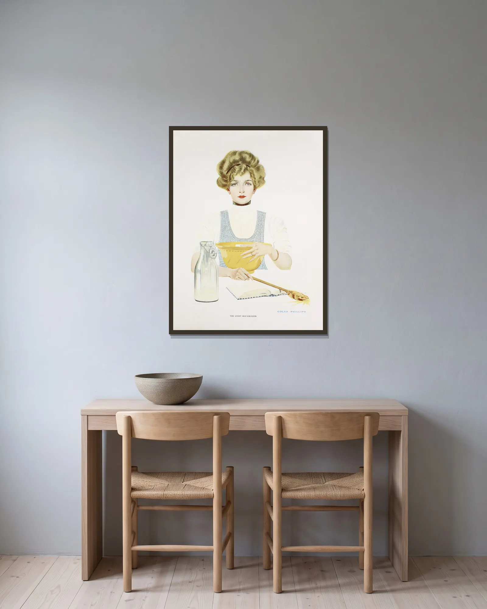 The light housekeeper av Coles Phillips inramad på en vägg