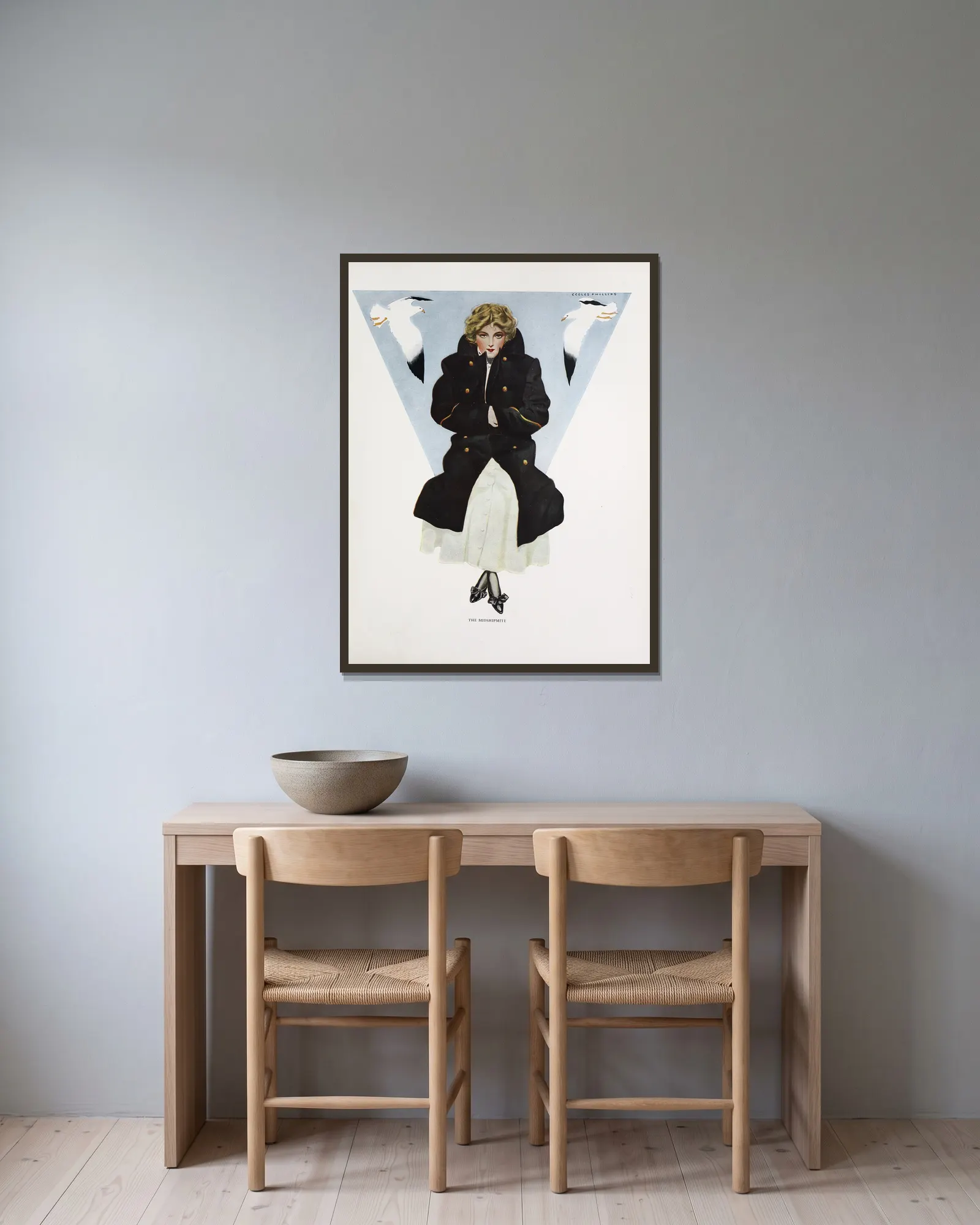 The midshipmite av Coles Phillips inramad på en vägg