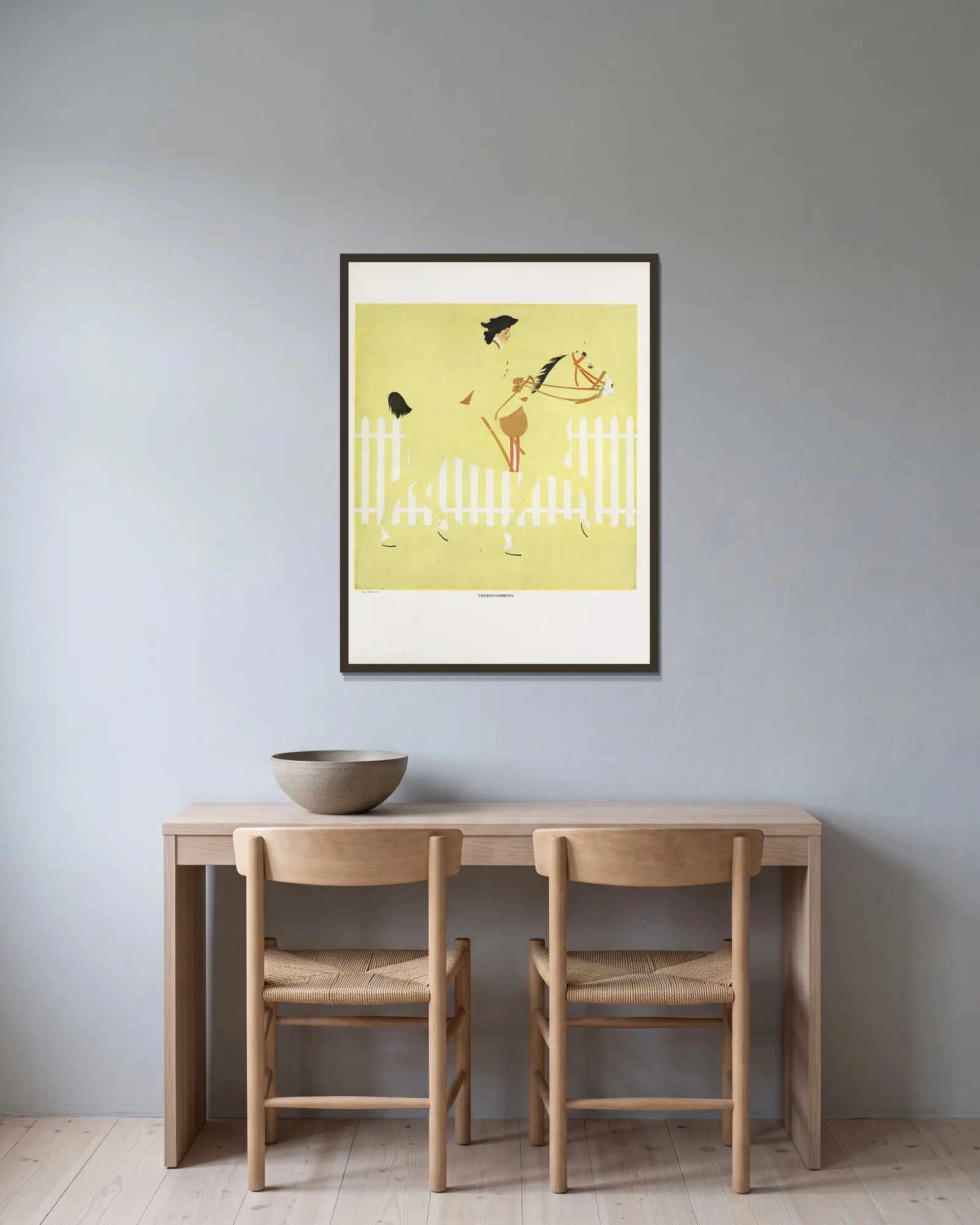 Thoroughbreds av Coles Phillips inramad på en vägg