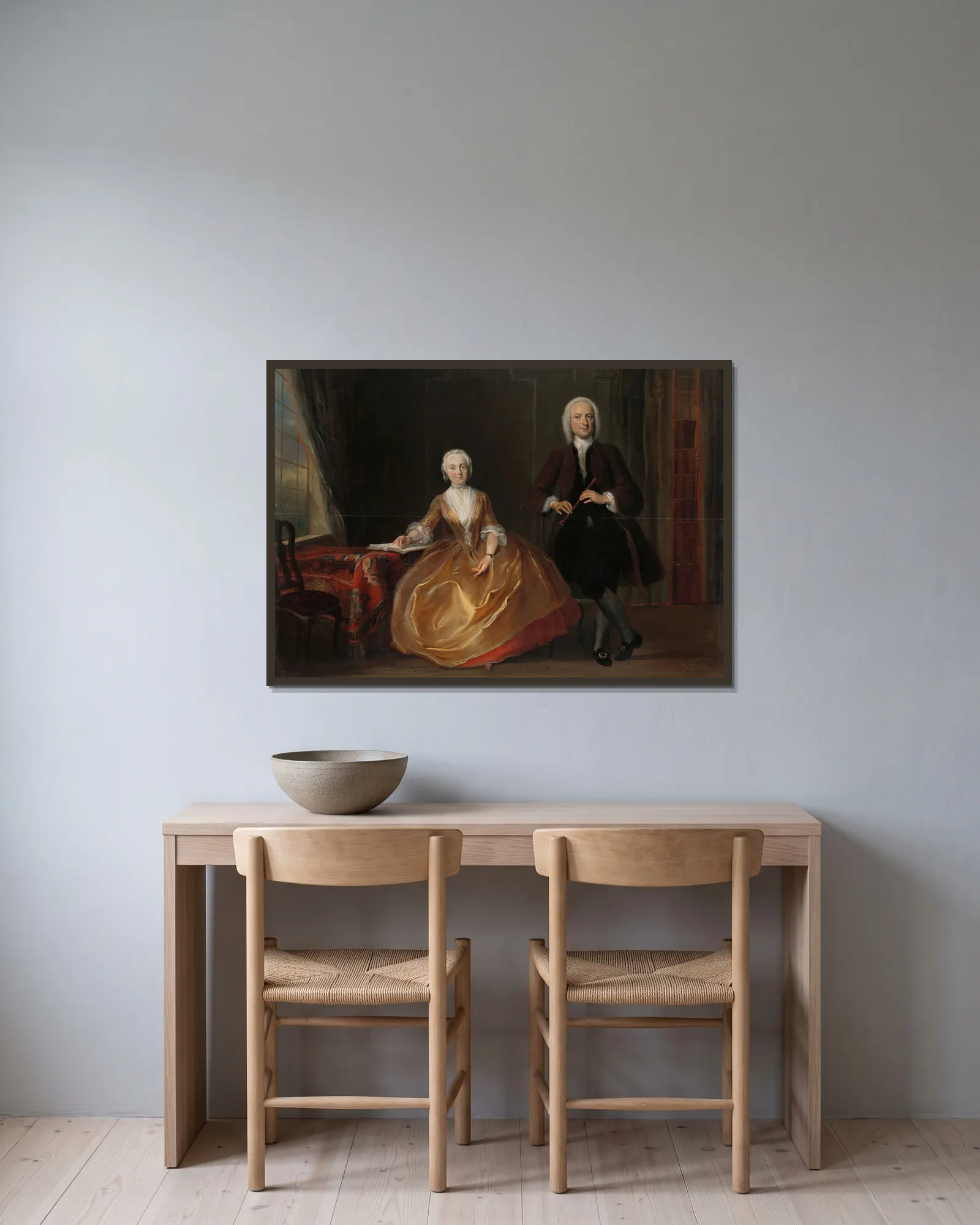 A Couple Making Music av Cornelis Troost inramad på en vägg