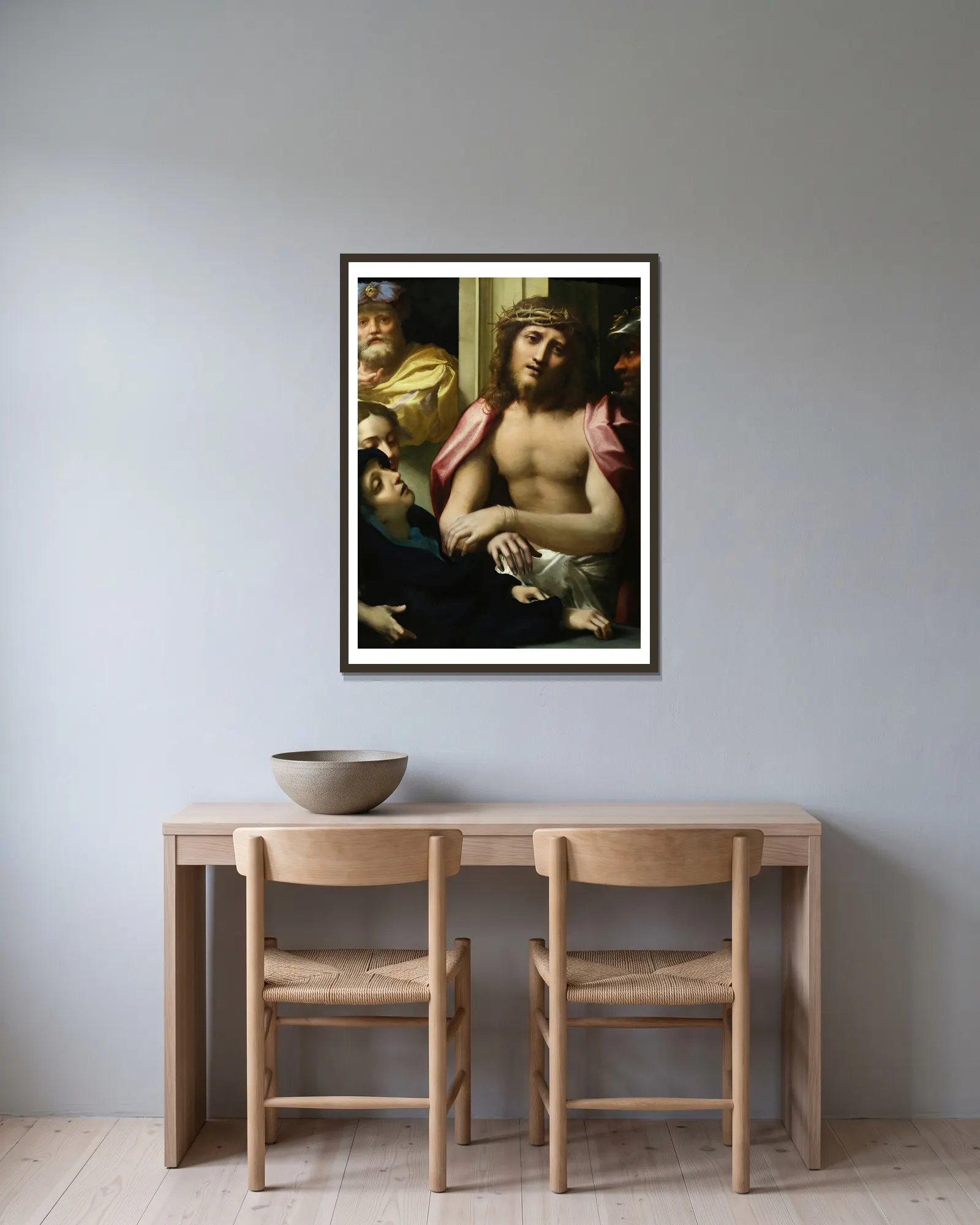Ecce Homo av Correggio inramad på en vägg