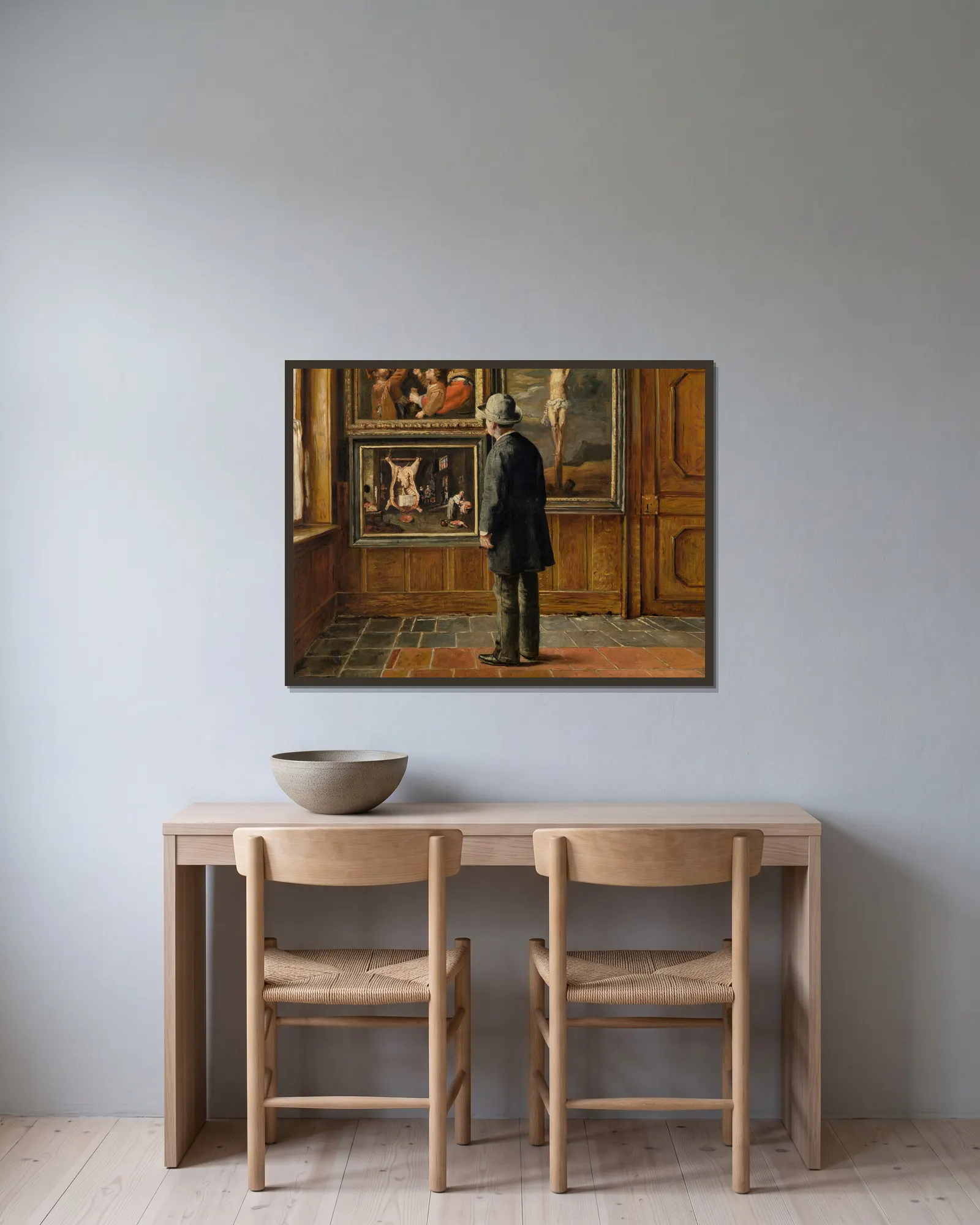 The Art Lover av Henri de Braekeleer inramad på en vägg