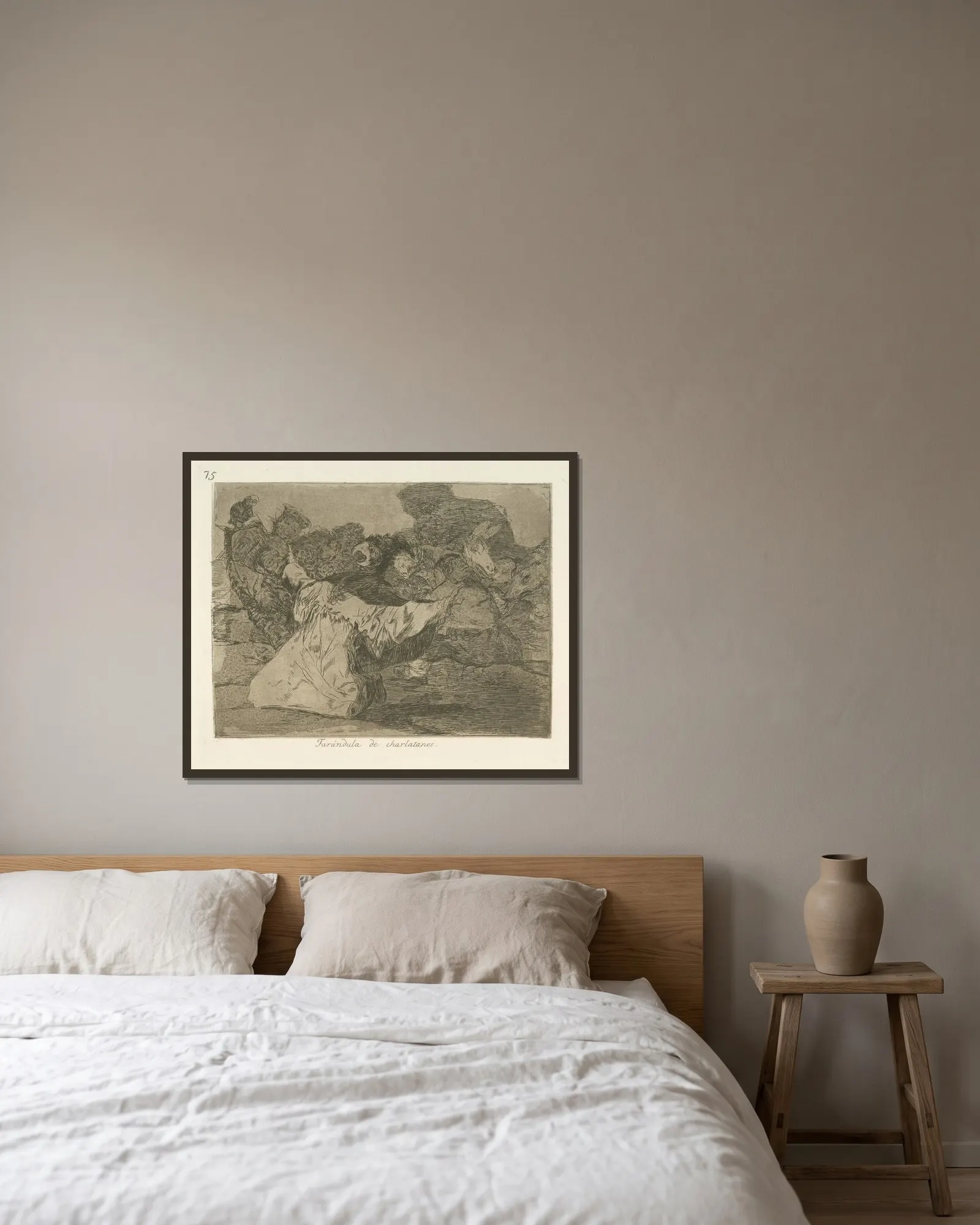 Farándula de charlatanes av Francisco de Goya inramad på en vägg