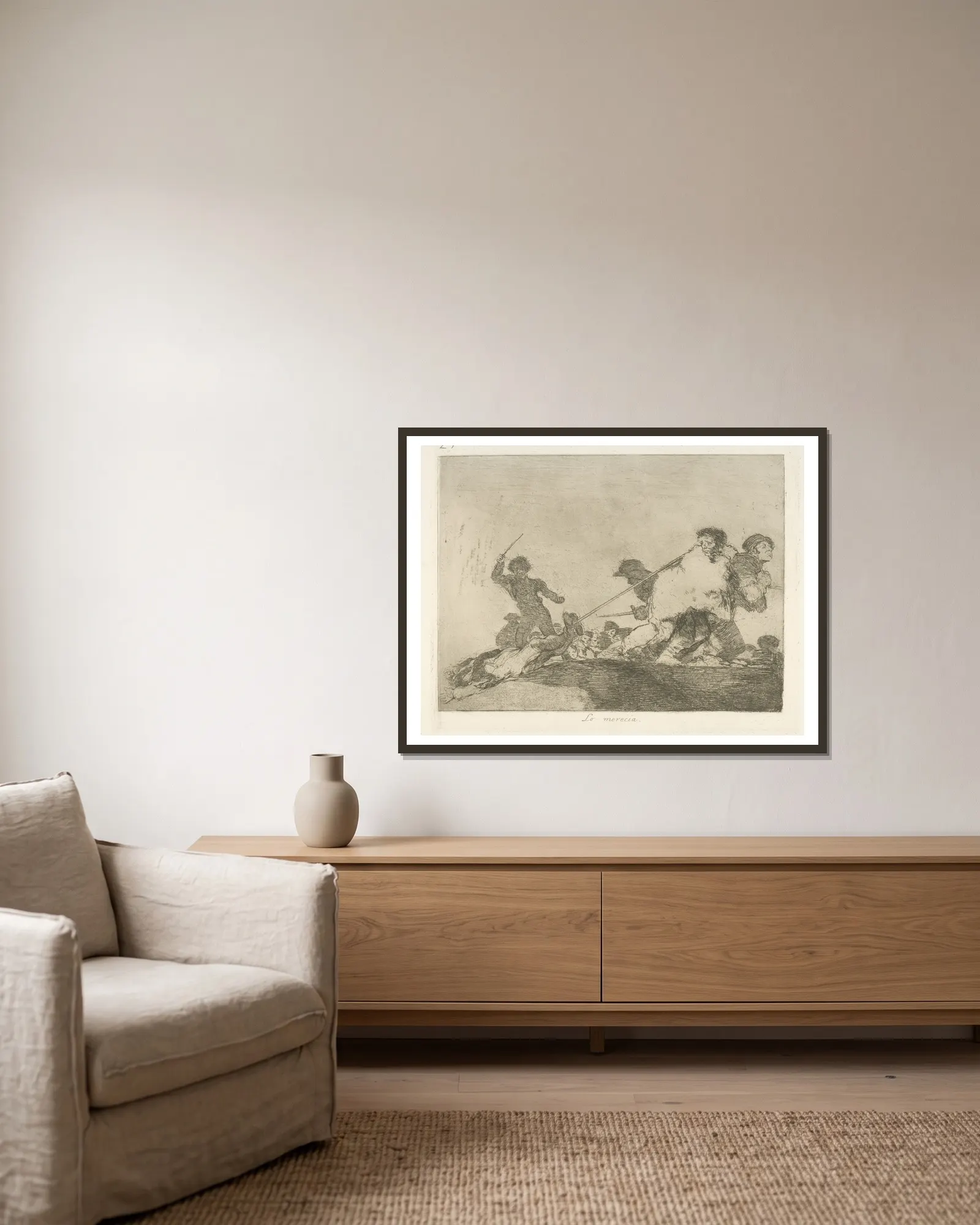 Lo merecia av Francisco de Goya inramad på en vägg