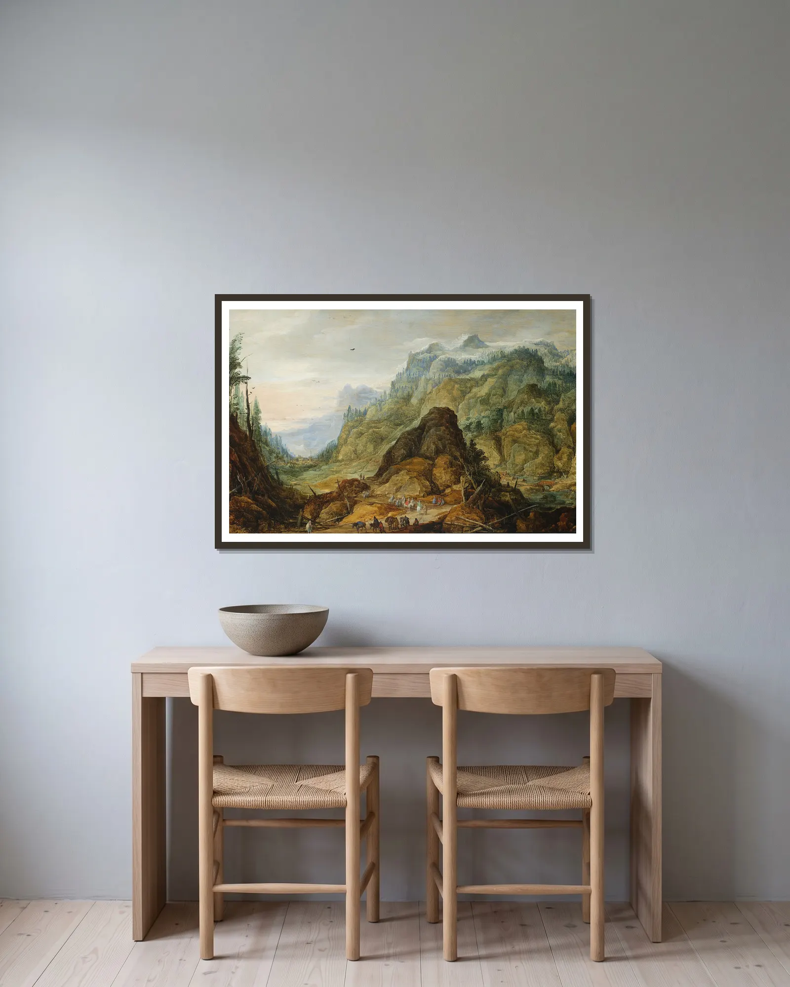 Mountain landscape with a caravan av Joos de Momper inramad på en vägg