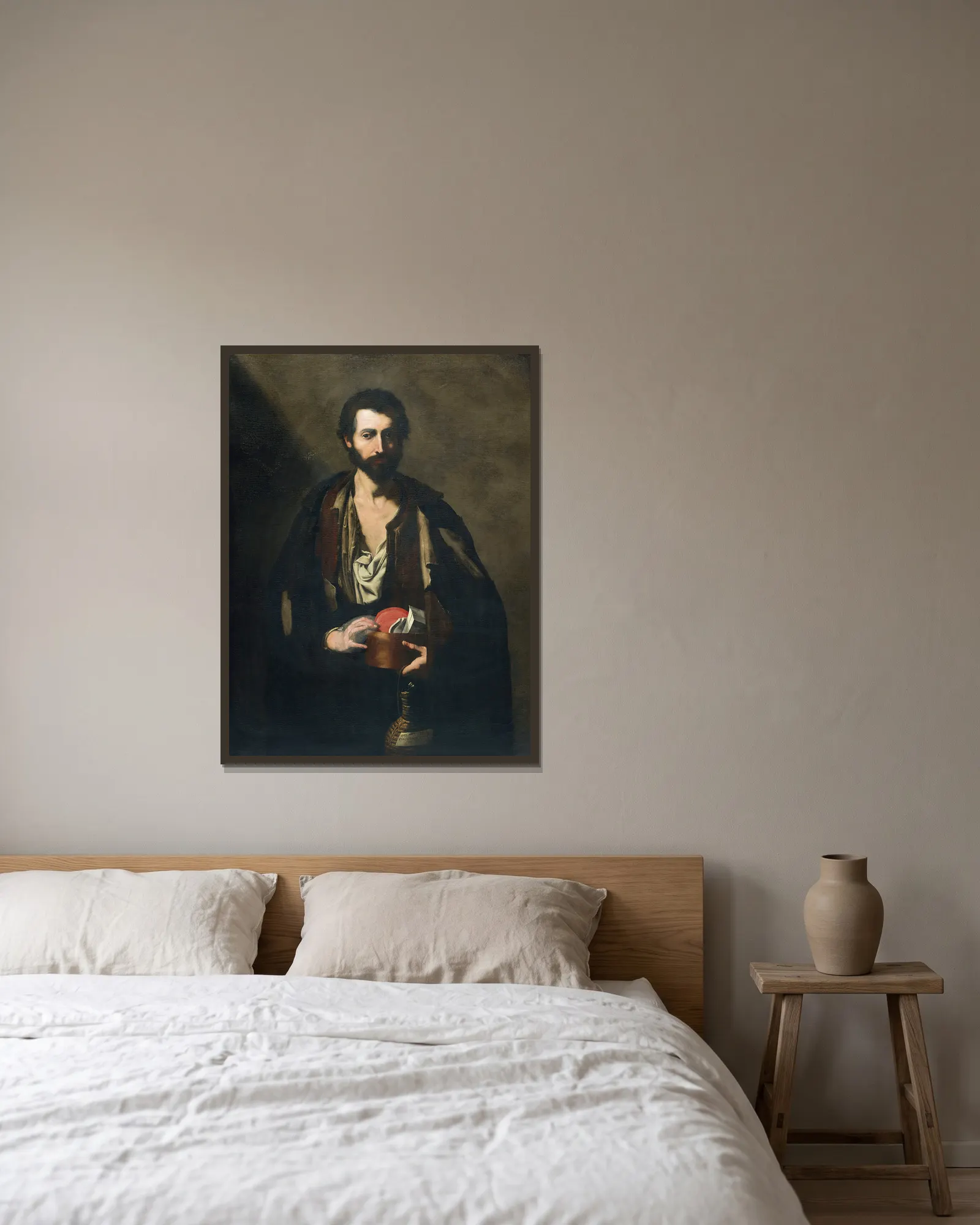 A philosopher with a wine flask av Jusepe de Ribera inramad på en vägg